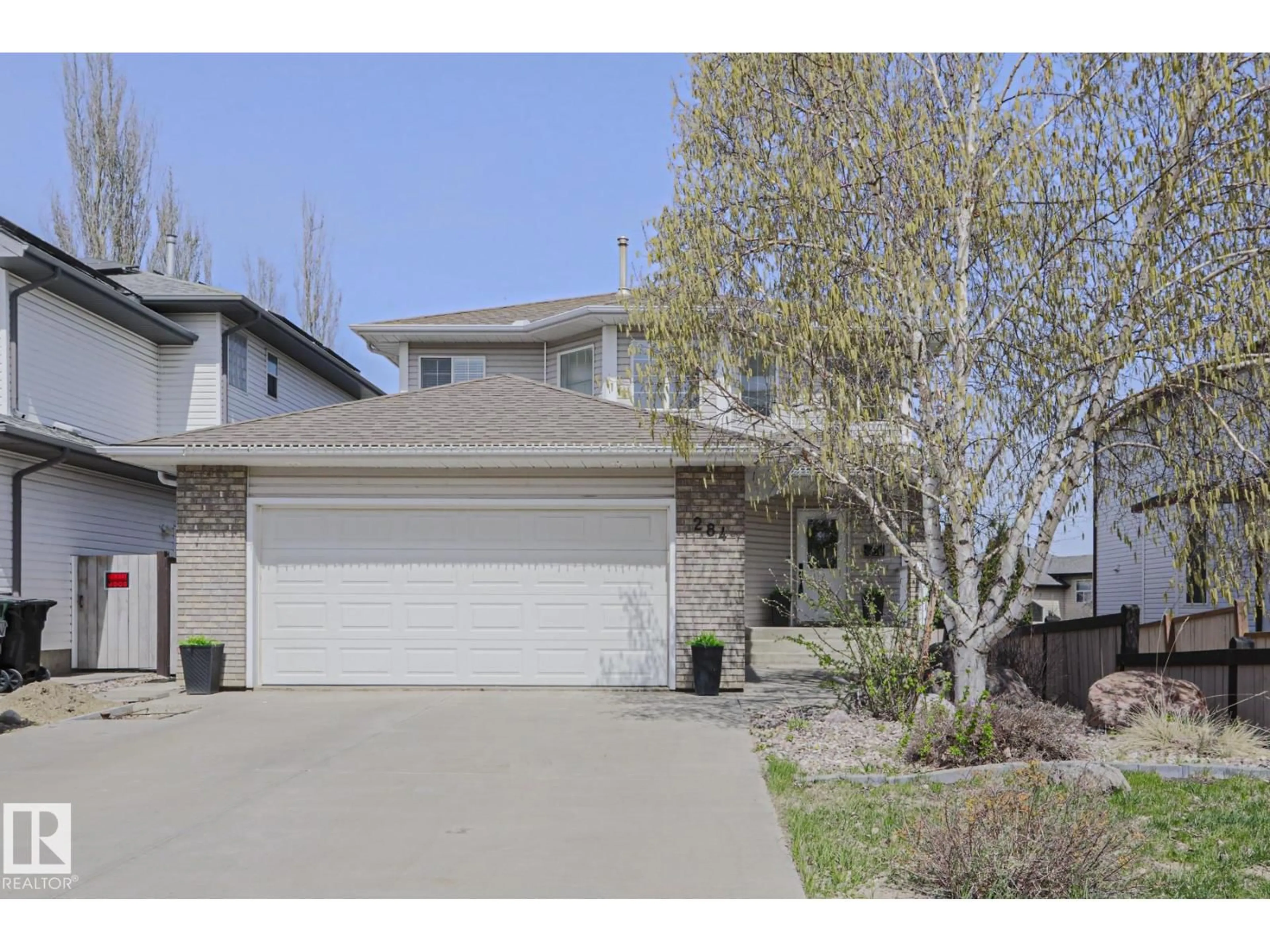 Home with vinyl exterior material, street for 284 LILAC TR, Sherwood Park Alberta T8H1Z2
