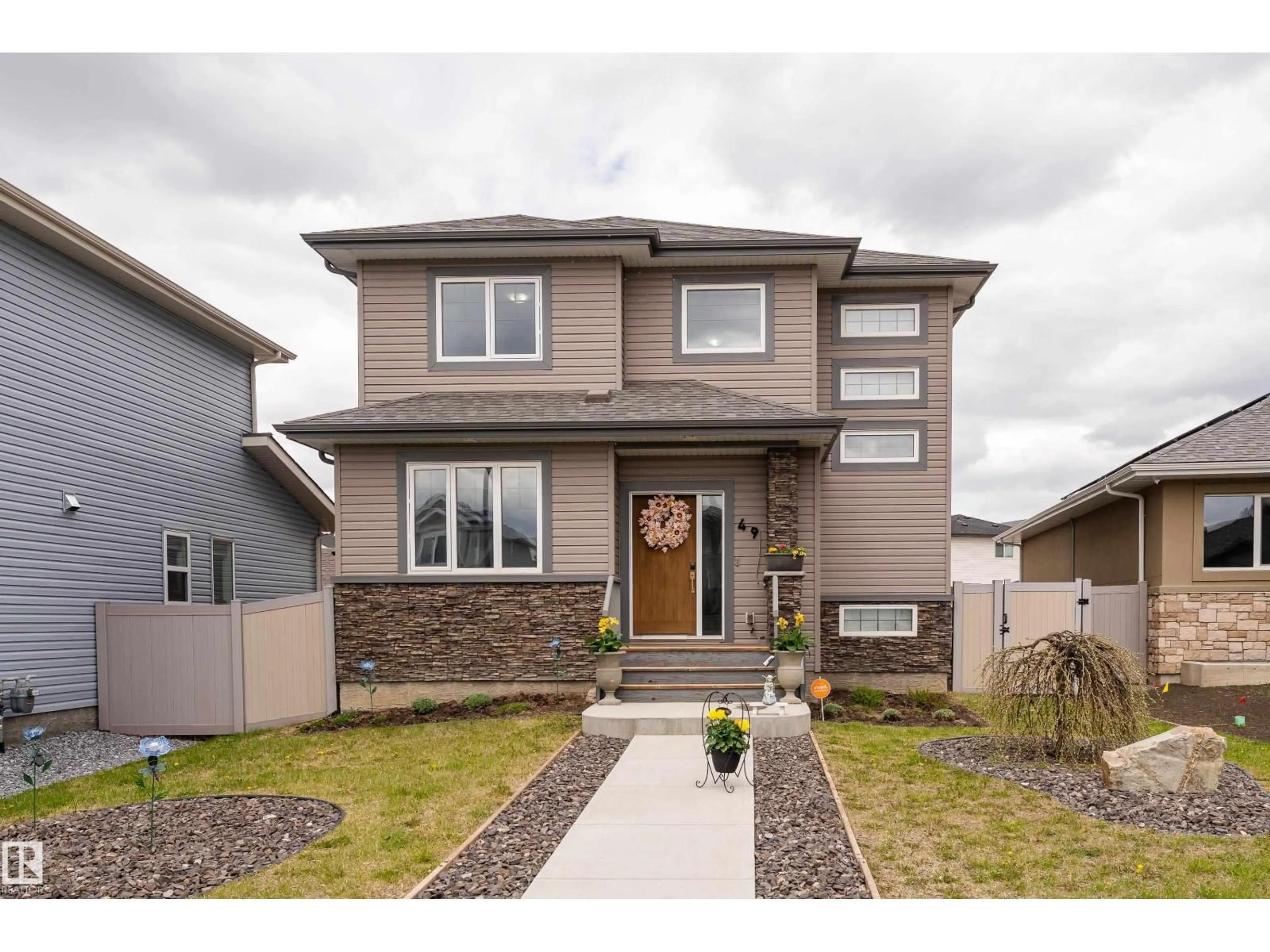 Home with brick exterior material, street for 49 WILSON CL, Fort Saskatchewan Alberta T8L0W7