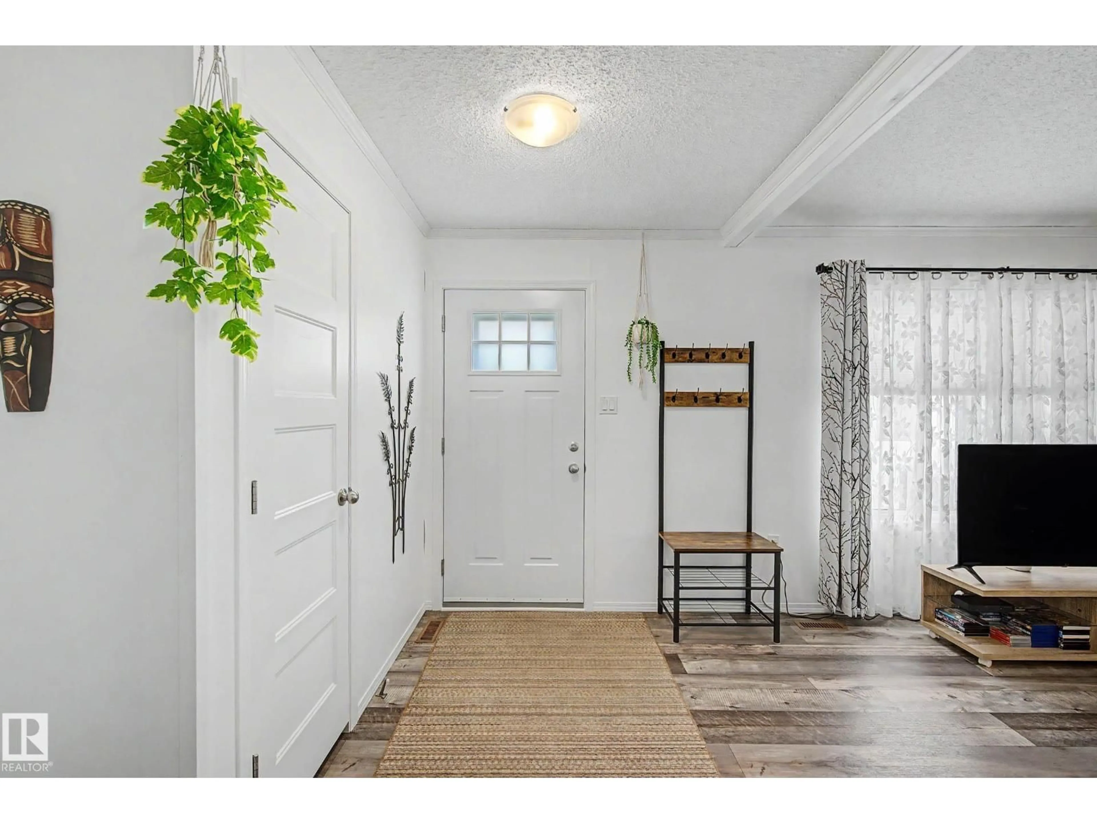 Indoor entryway for #15 - 12604 153 AV, Edmonton Alberta T5X4M7