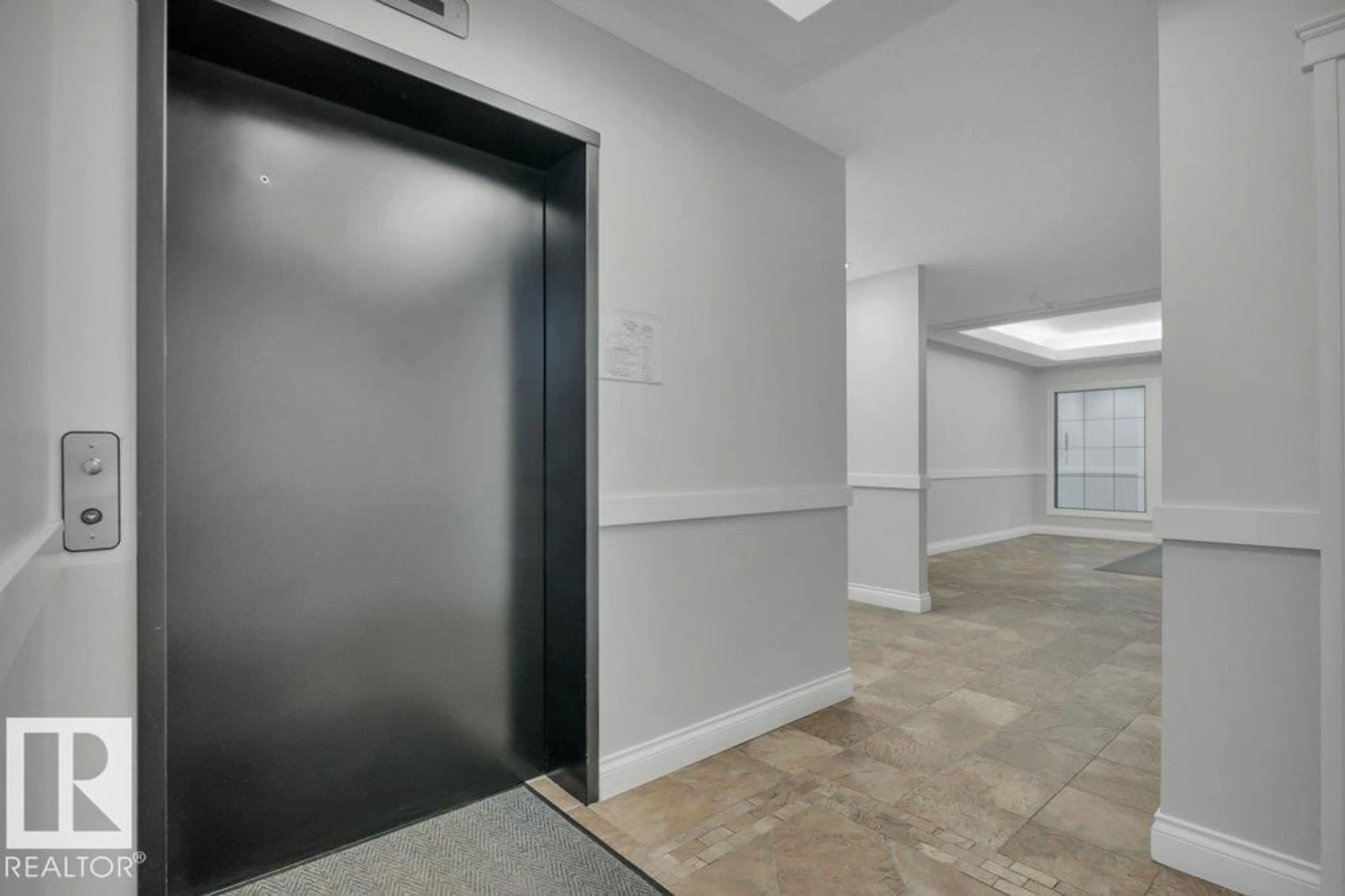 Indoor foyer for 306 - 10232 115 ST NW, Edmonton Alberta T5K1T8