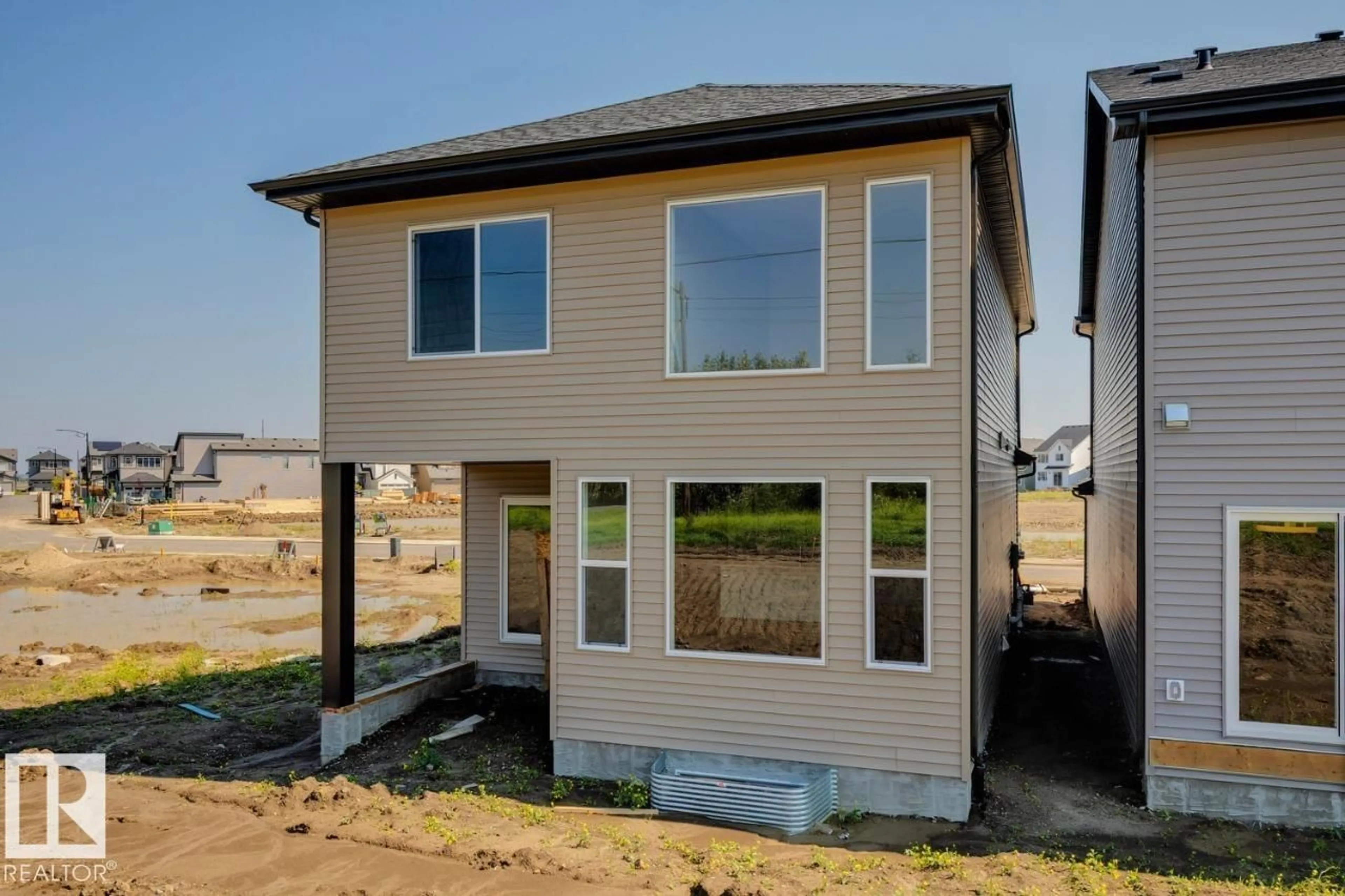 Home with vinyl exterior material, unknown for 17332 5TH ST, Edmonton Alberta T5Y6G4