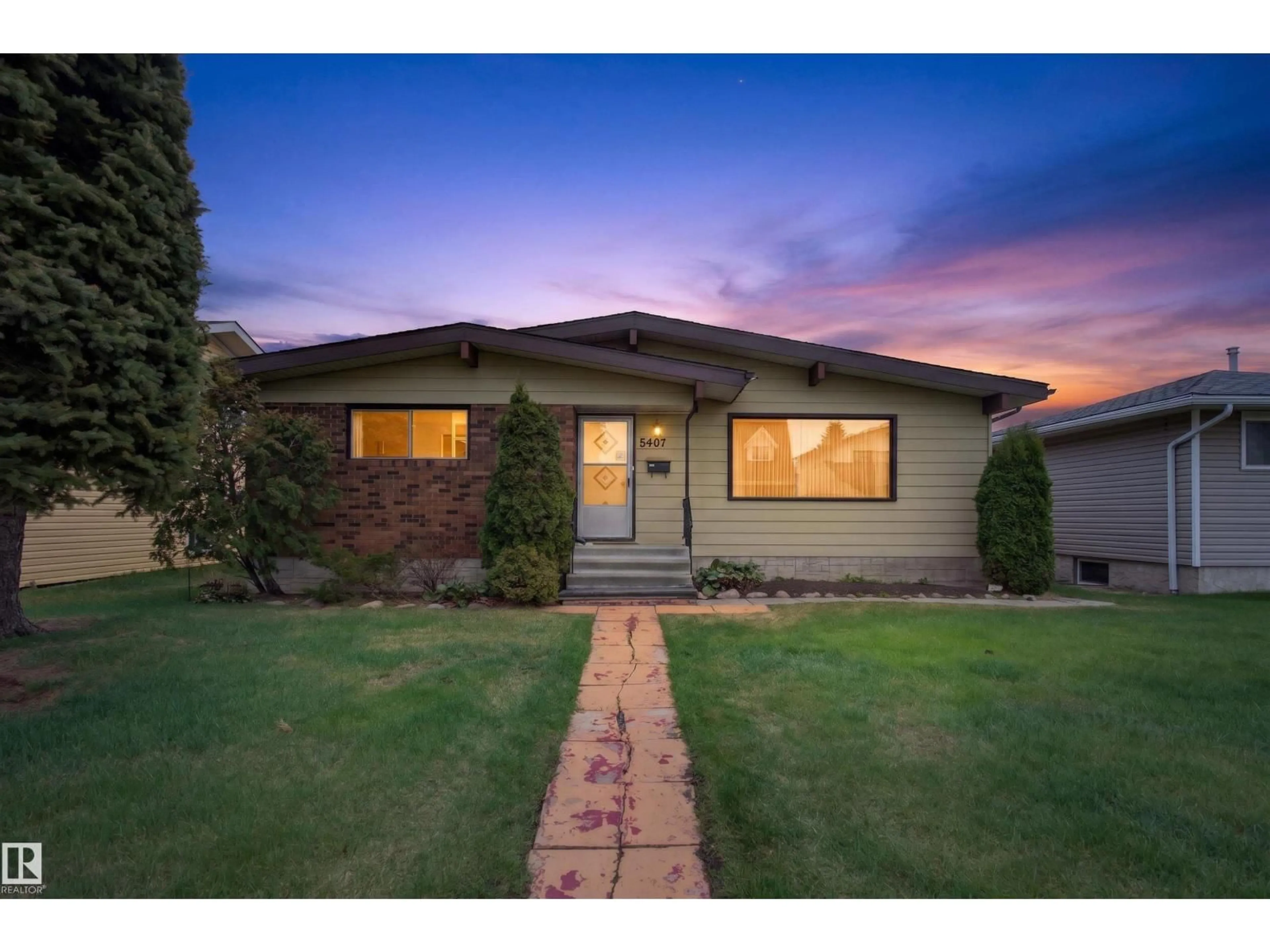 Home with brick exterior material, street for 8407 150 AV, Edmonton Alberta T5E1B9