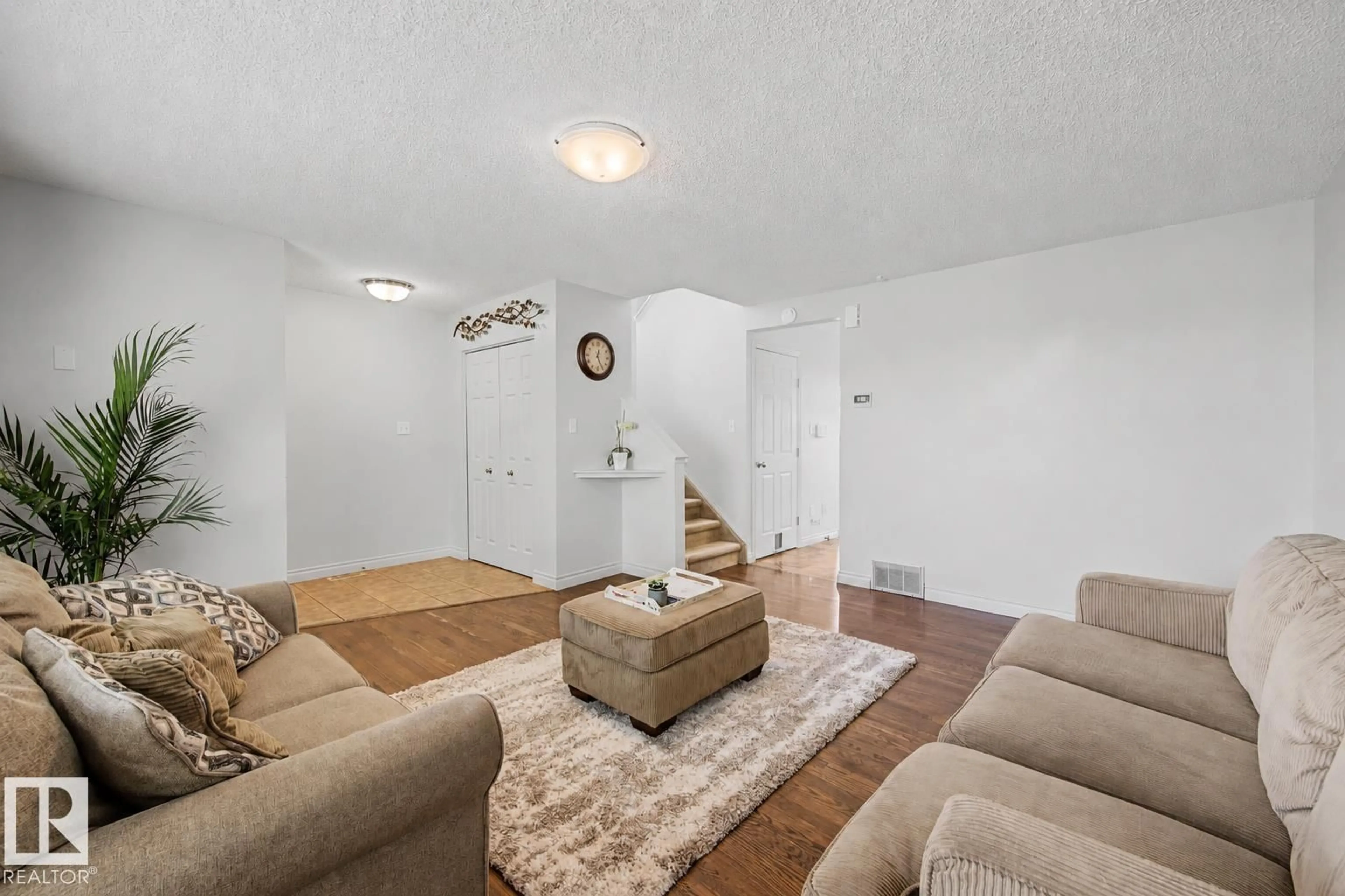 Living room with furniture, unknown for NW - 16211 55A ST, Edmonton Alberta T5Y2V1