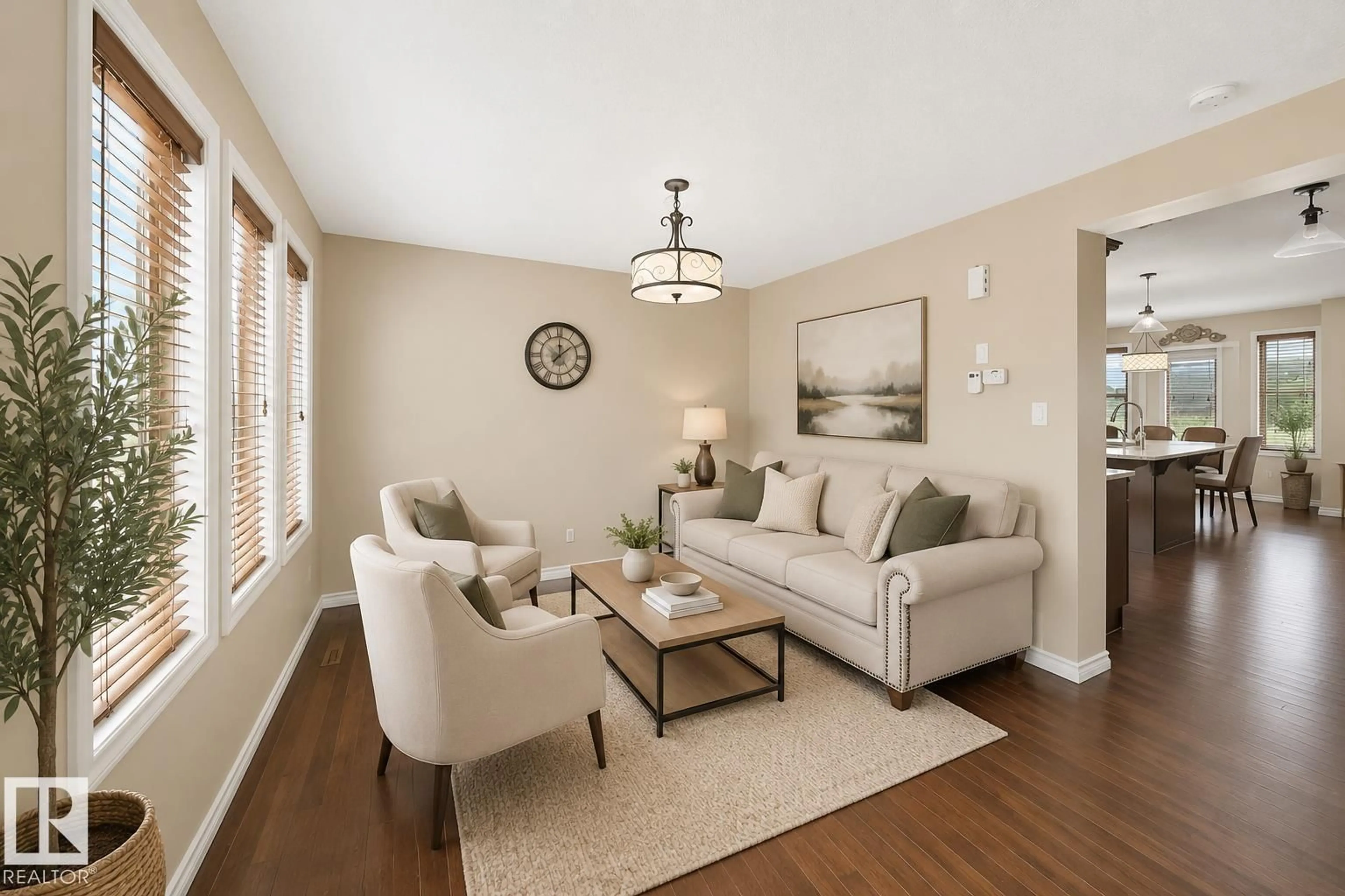 Living room with furniture, wood/laminate floor for SW SW - 3609 WEIDLE BEND BN, Edmonton Alberta T6X1T5