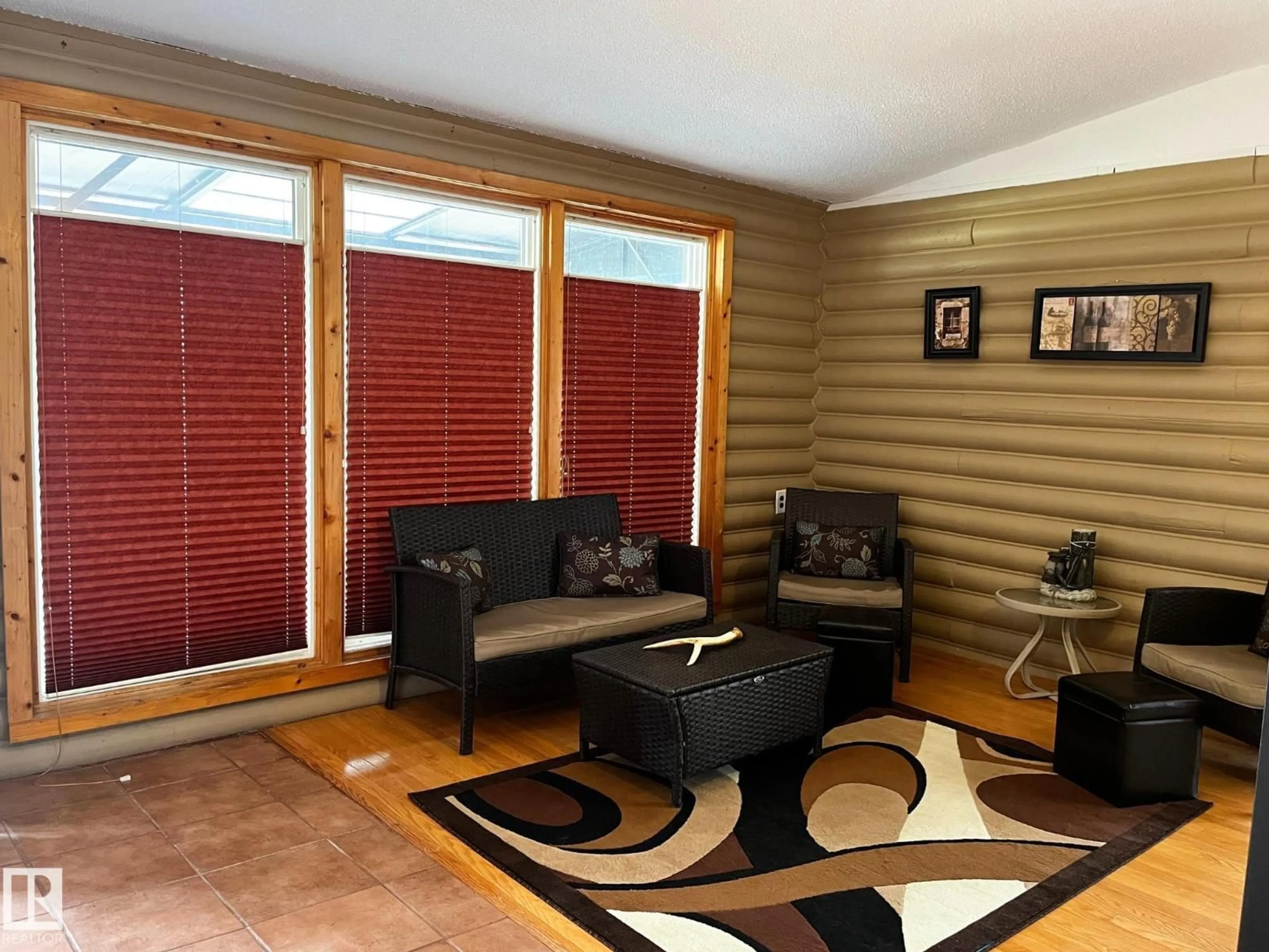 Living room with furniture, wood/laminate floor for 408 4 ST, Rural Lac Ste. Anne County Alberta T0E1A0