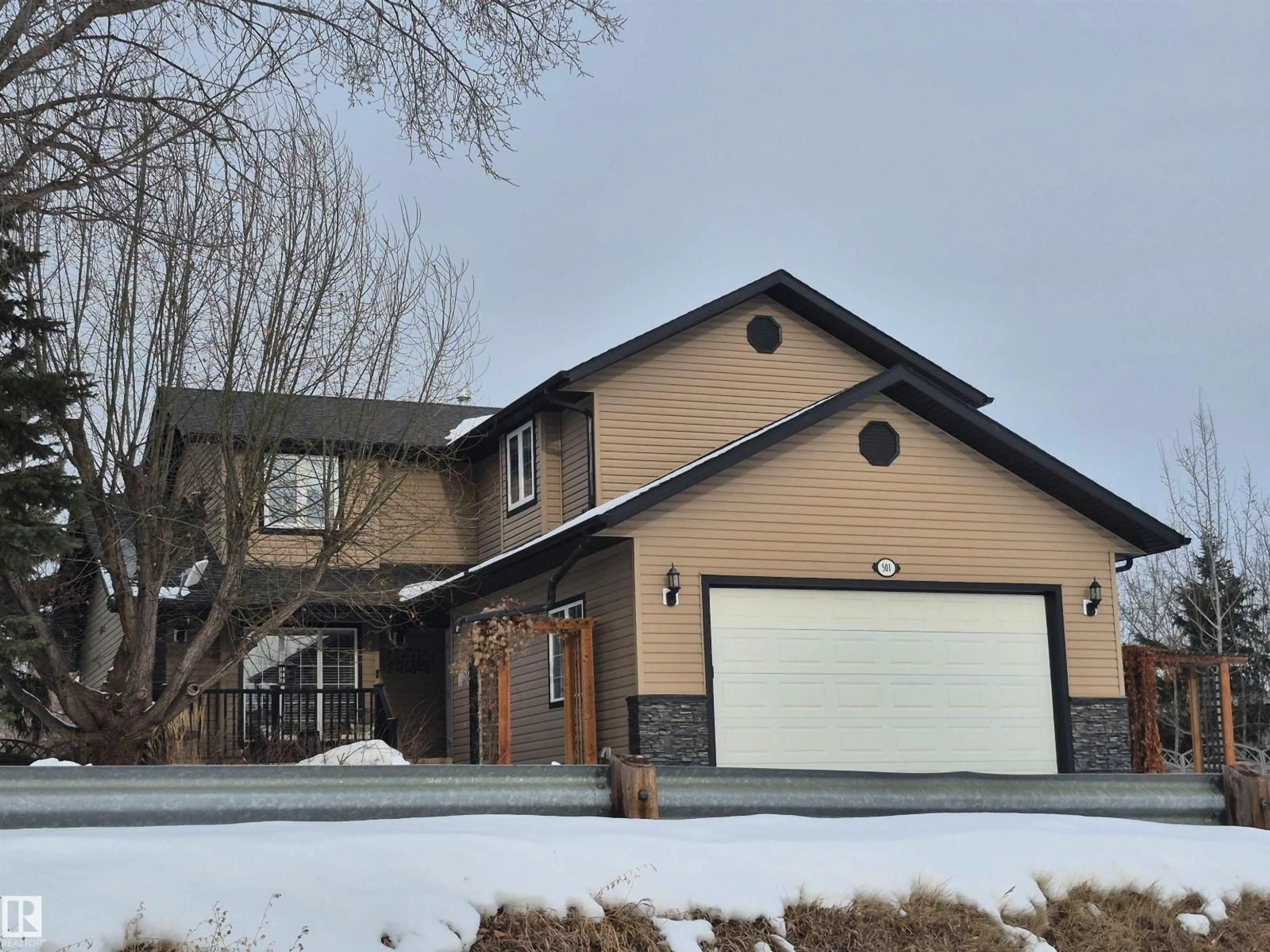 Home with vinyl exterior material, street for 501 LAKESIDE DR, Rural Parkland County Alberta T7Z2V5