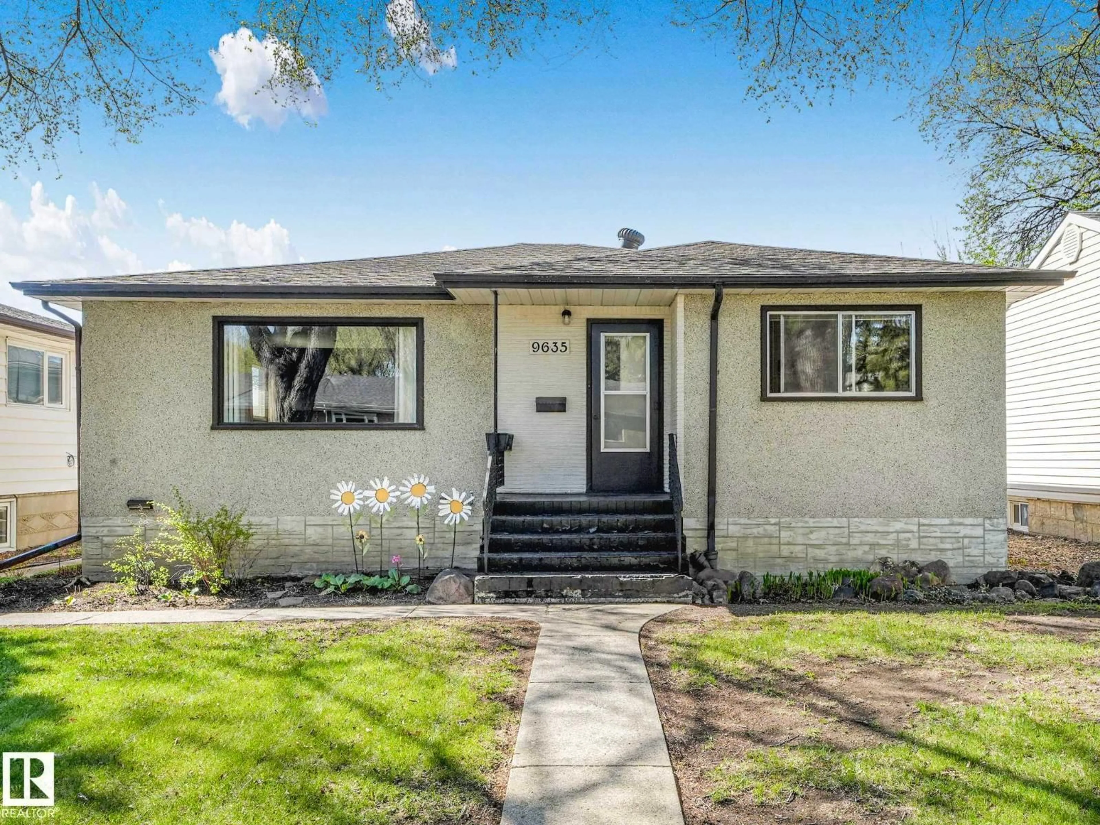 Home with vinyl exterior material, street for 9635 64 AV, Edmonton Alberta T6E0J2