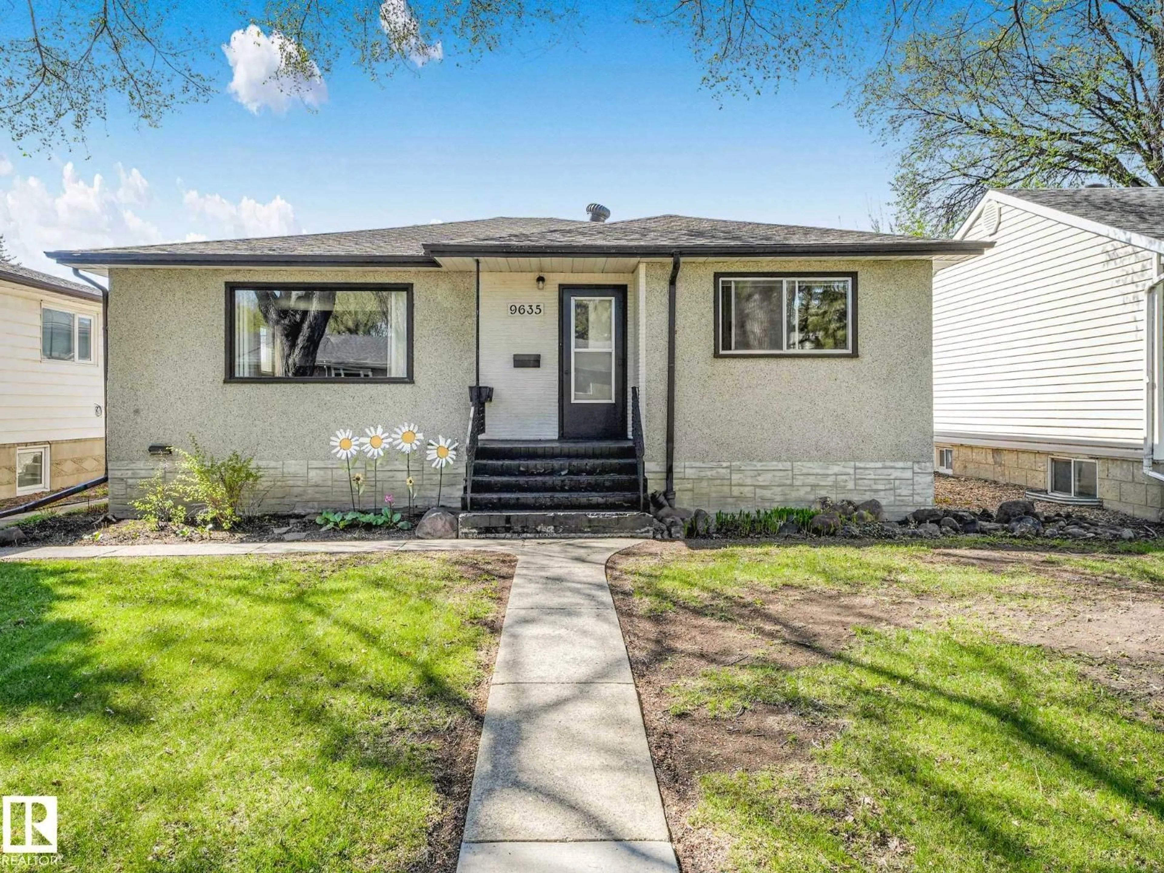 Home with vinyl exterior material, street for 9635 64 AV, Edmonton Alberta T6E0J2