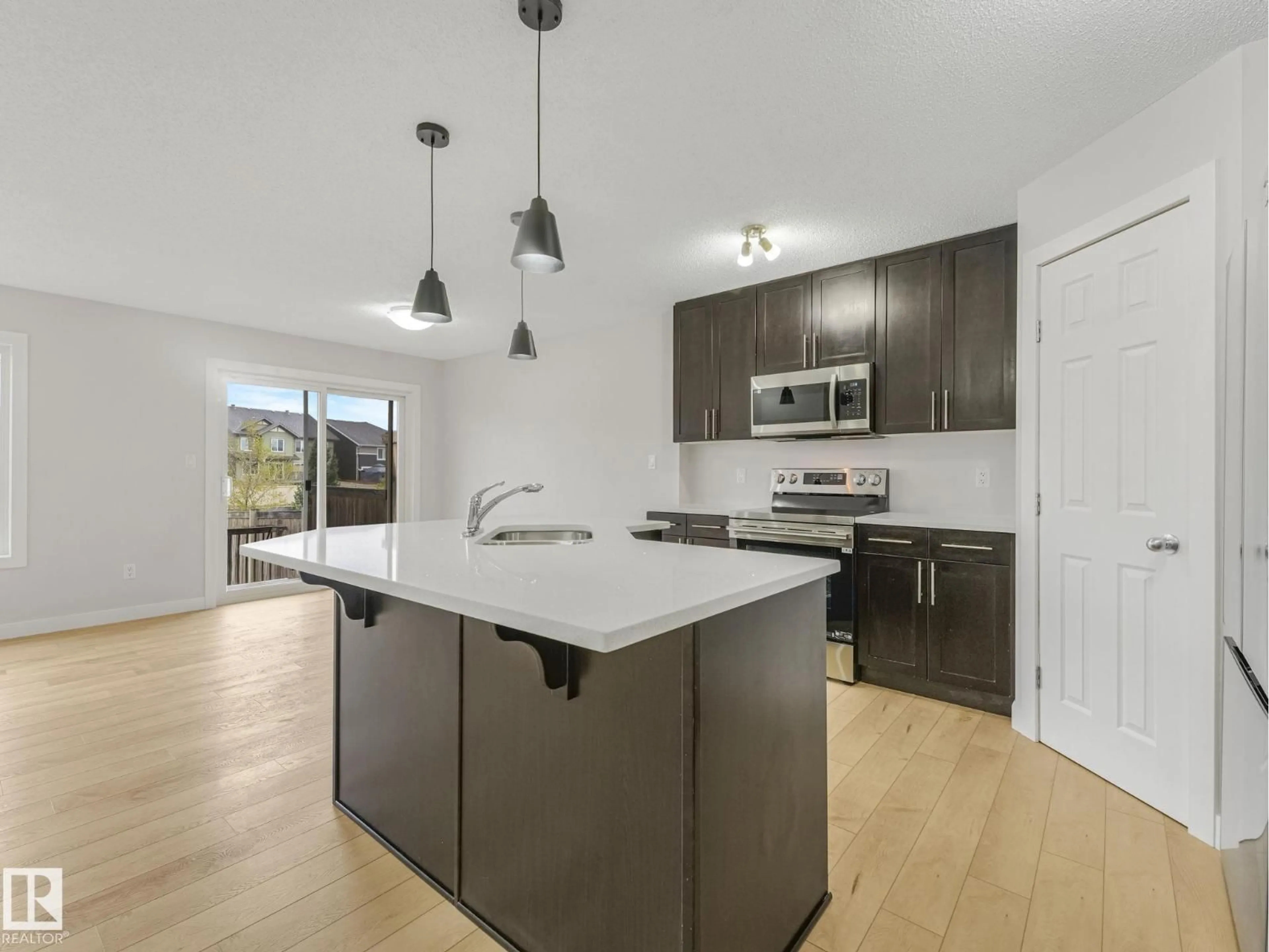 Open concept kitchen, unknown for 7327 24 AV, Edmonton Alberta T6X0V5