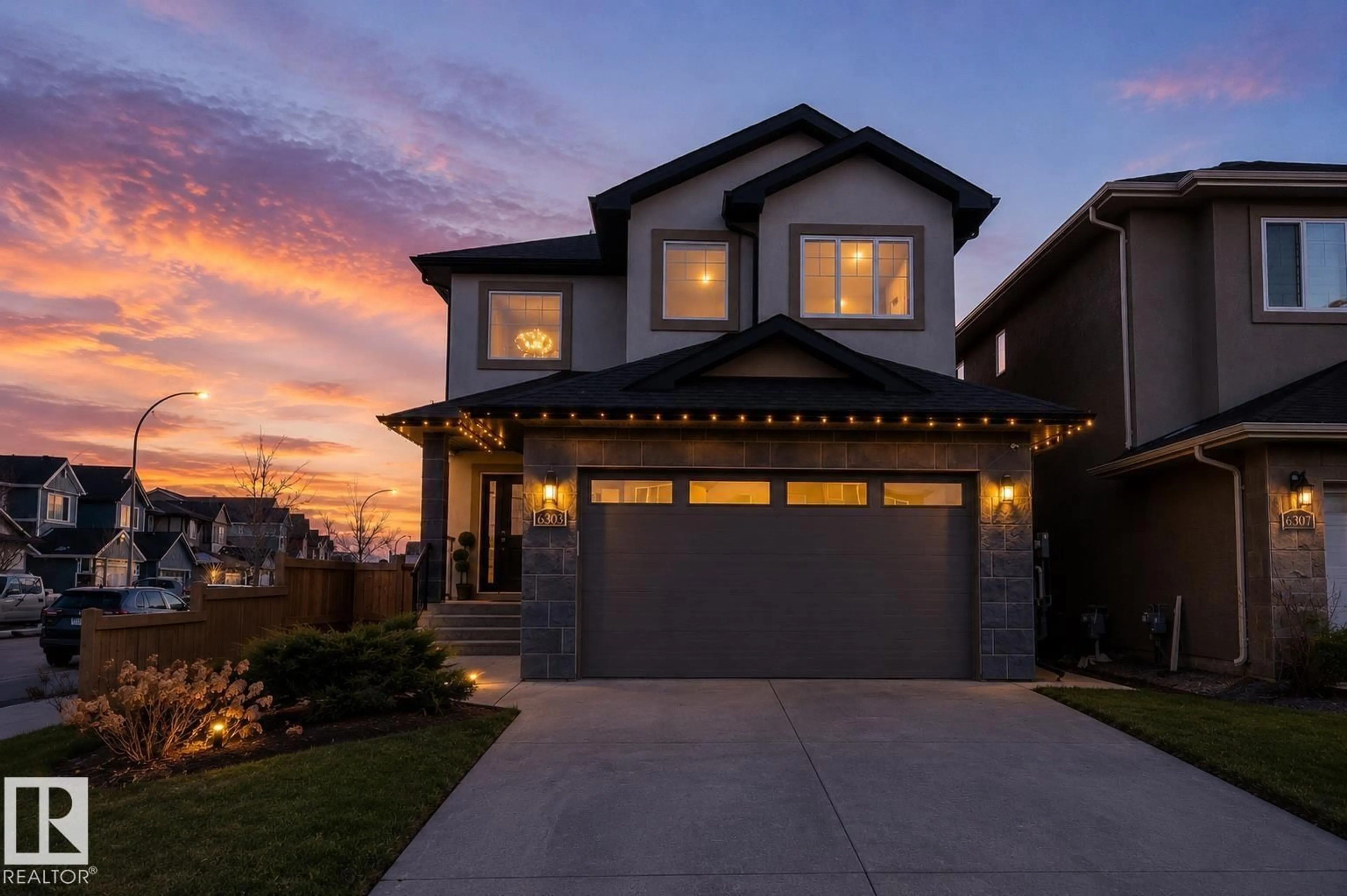 Home with brick exterior material, street for 6303 169 AV, Edmonton Alberta T5Y3V4