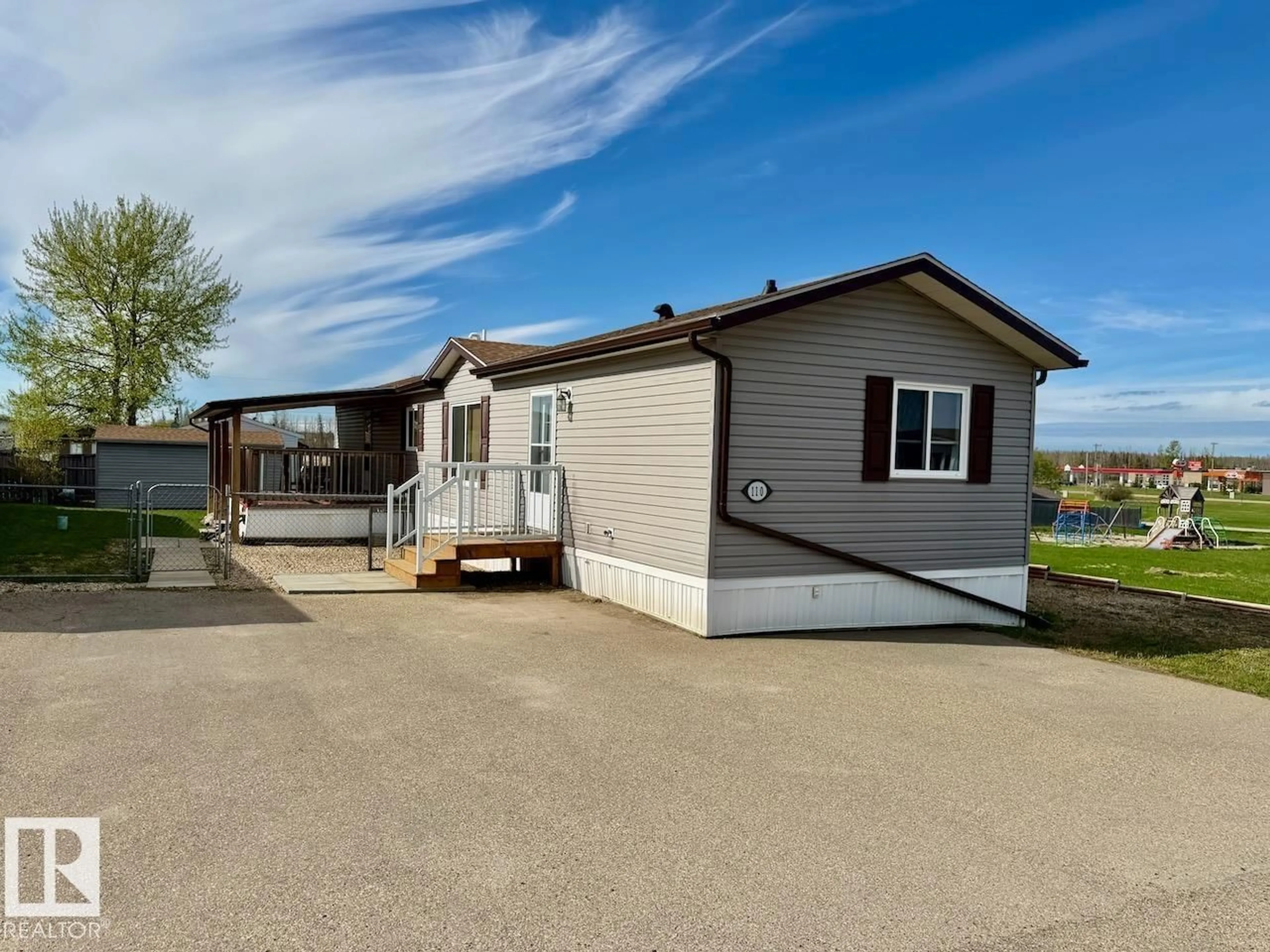Home with vinyl exterior material, water/lake/river/ocean view for 110 - 2251 50 ST, Drayton Valley Alberta T7A1W1