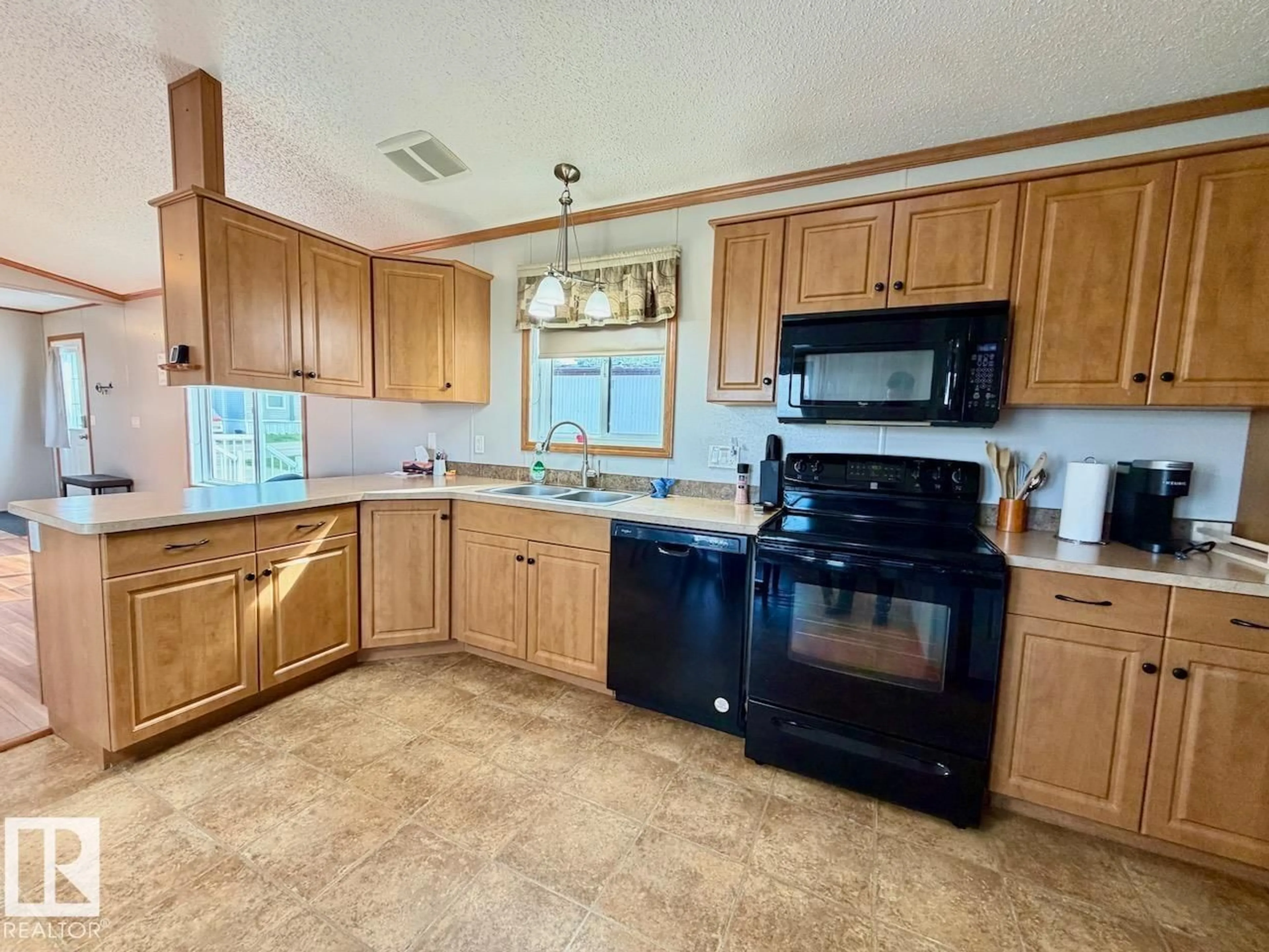 Standard kitchen, ceramic/tile floor for 110 - 2251 50 ST, Drayton Valley Alberta T7A1W1