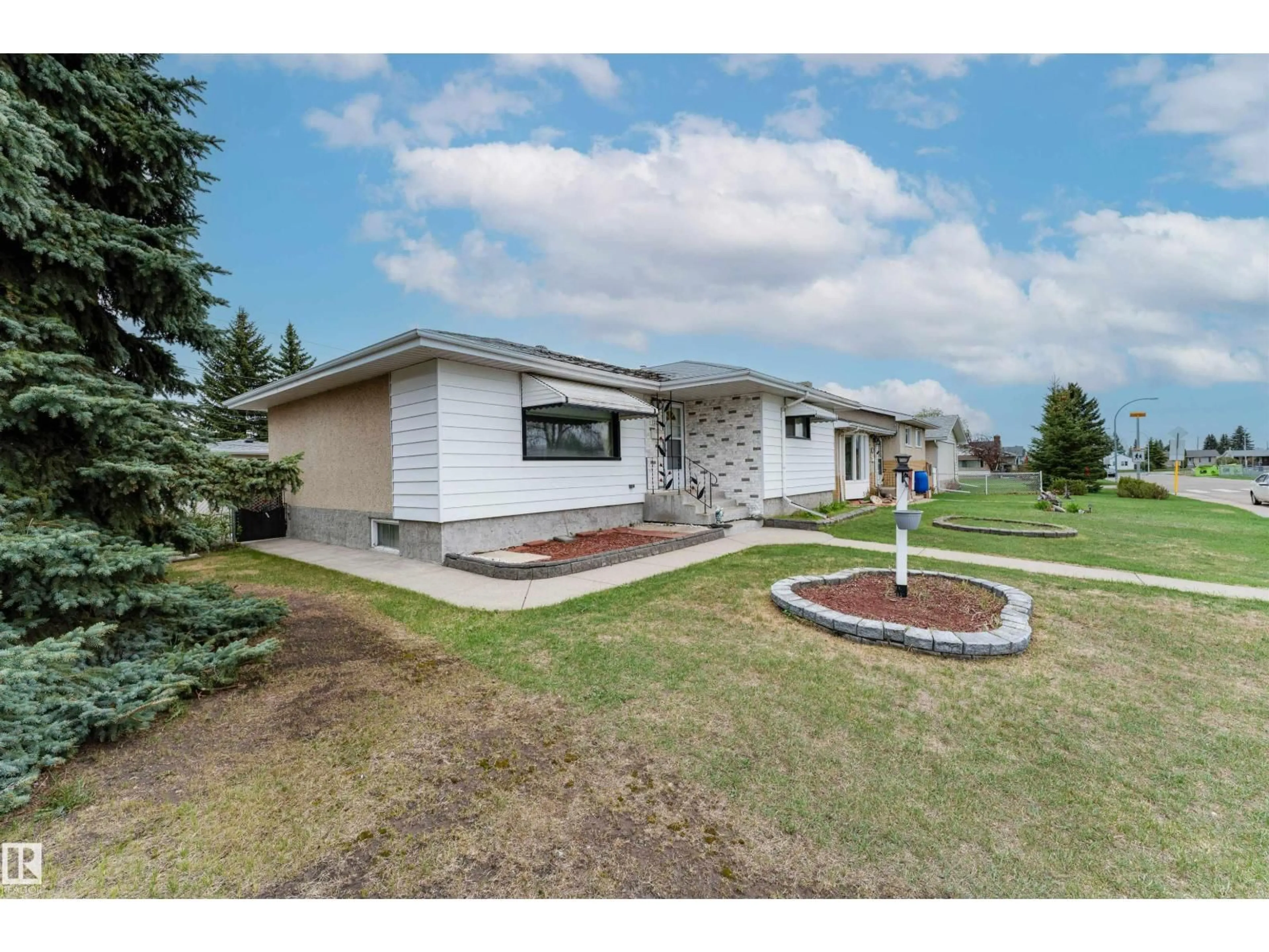 A pic from outside/outdoor area/front of a property/back of a property/a pic from drone, unknown for NW - 13231 74 ST, Edmonton Alberta T5C0X3