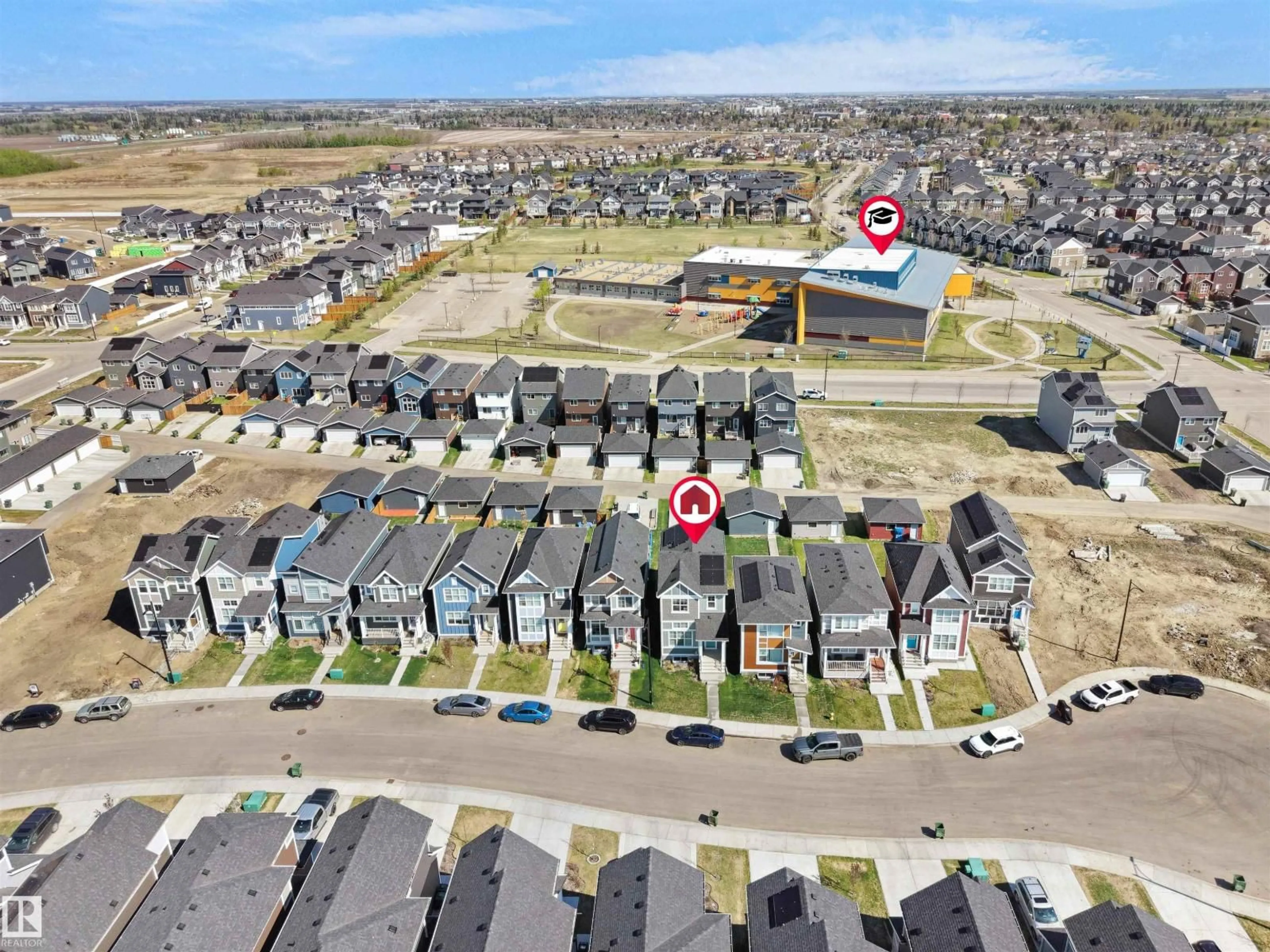 A pic from outside/outdoor area/front of a property/back of a property/a pic from drone, street for 114 STONEHOUSE WY, Leduc Alberta T9E1R1