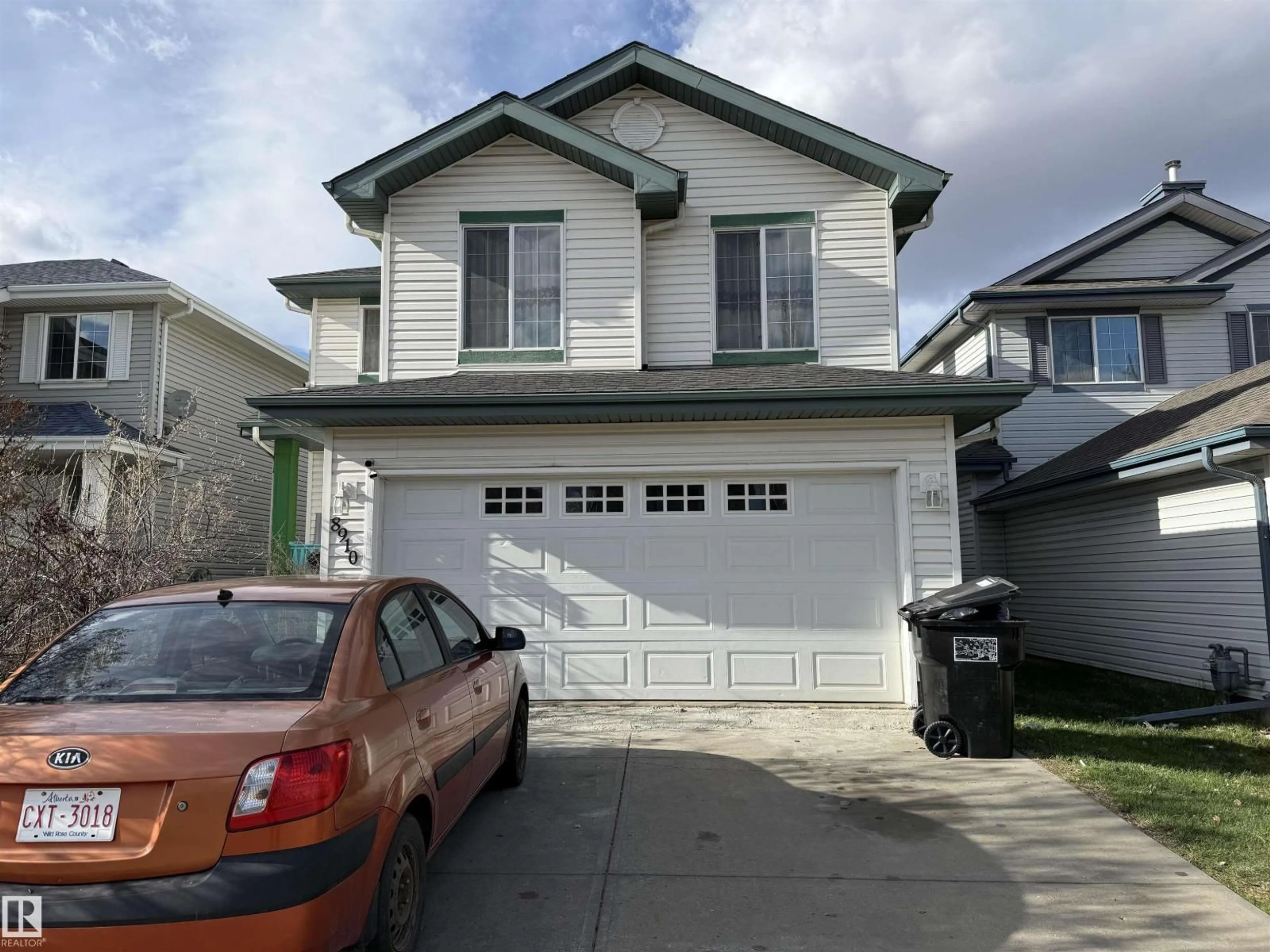 Home with vinyl exterior material, street for 8910 7 AV, Edmonton Alberta T6X1B9