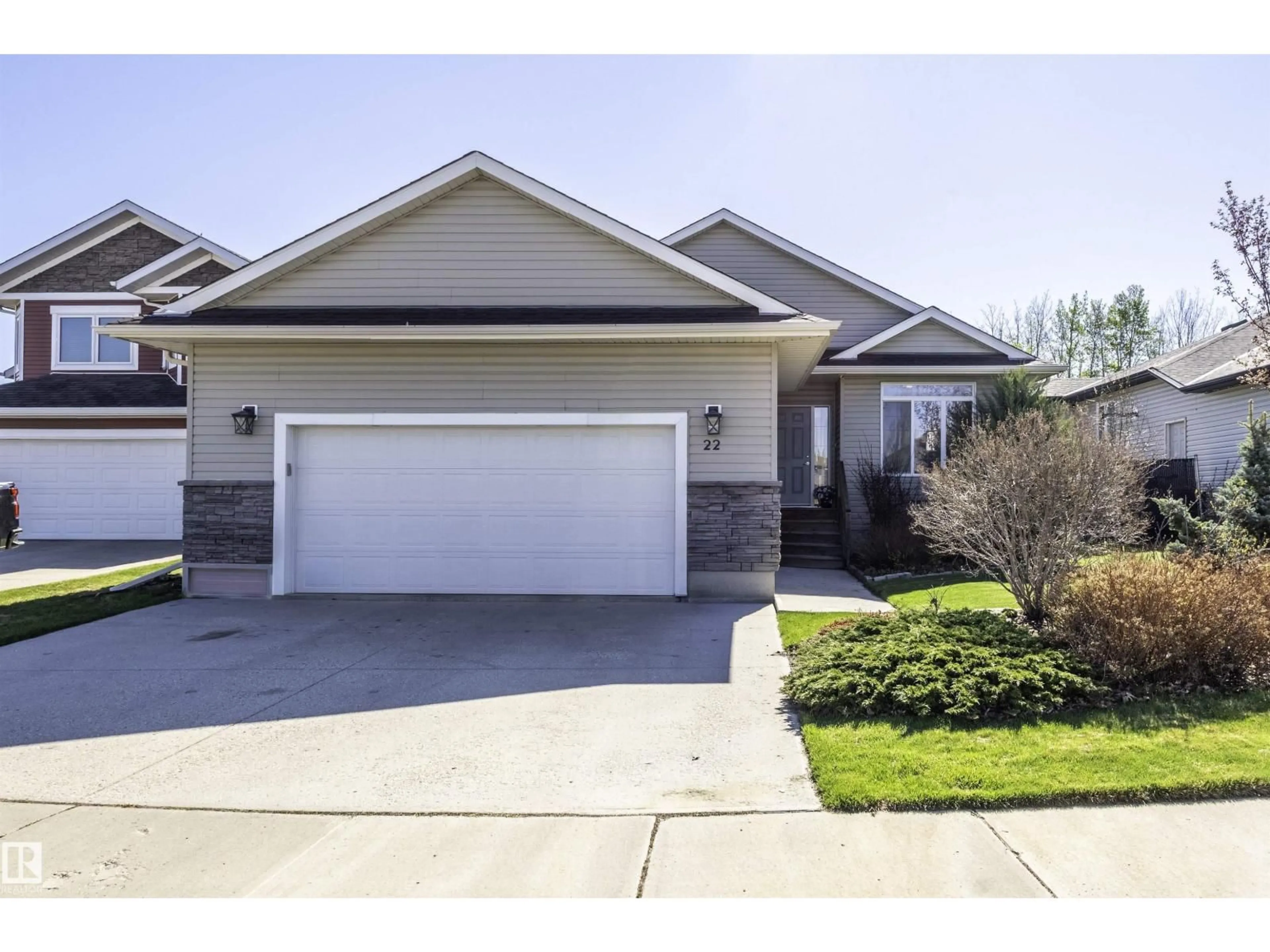 Home with vinyl exterior material, street for 22 STONY CREEK, Stony Plain Alberta T7Z2Z8