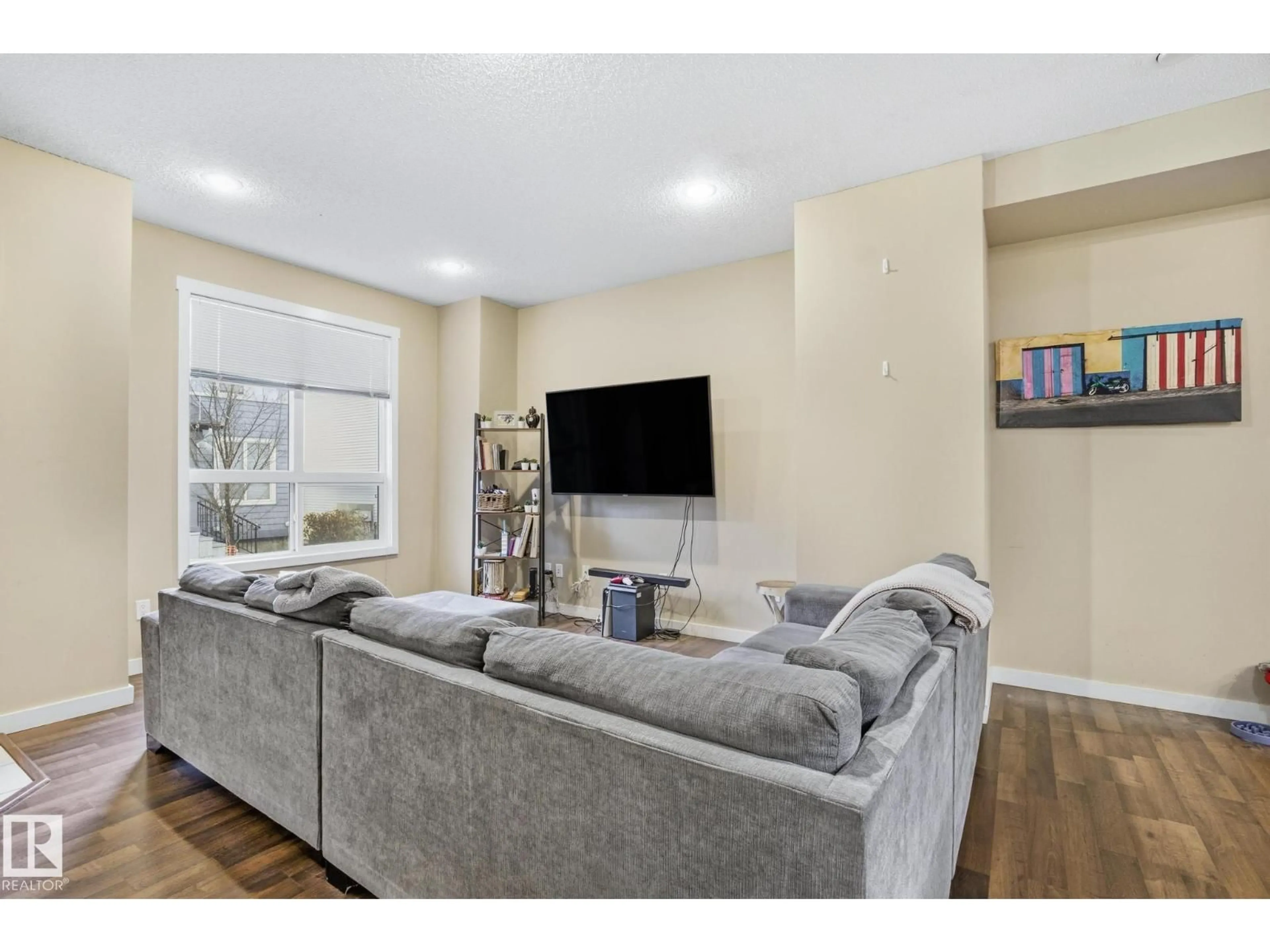 Living room with furniture, unknown for #30 - 6075 SCHONSEE WY, Edmonton Alberta T5Z0H4