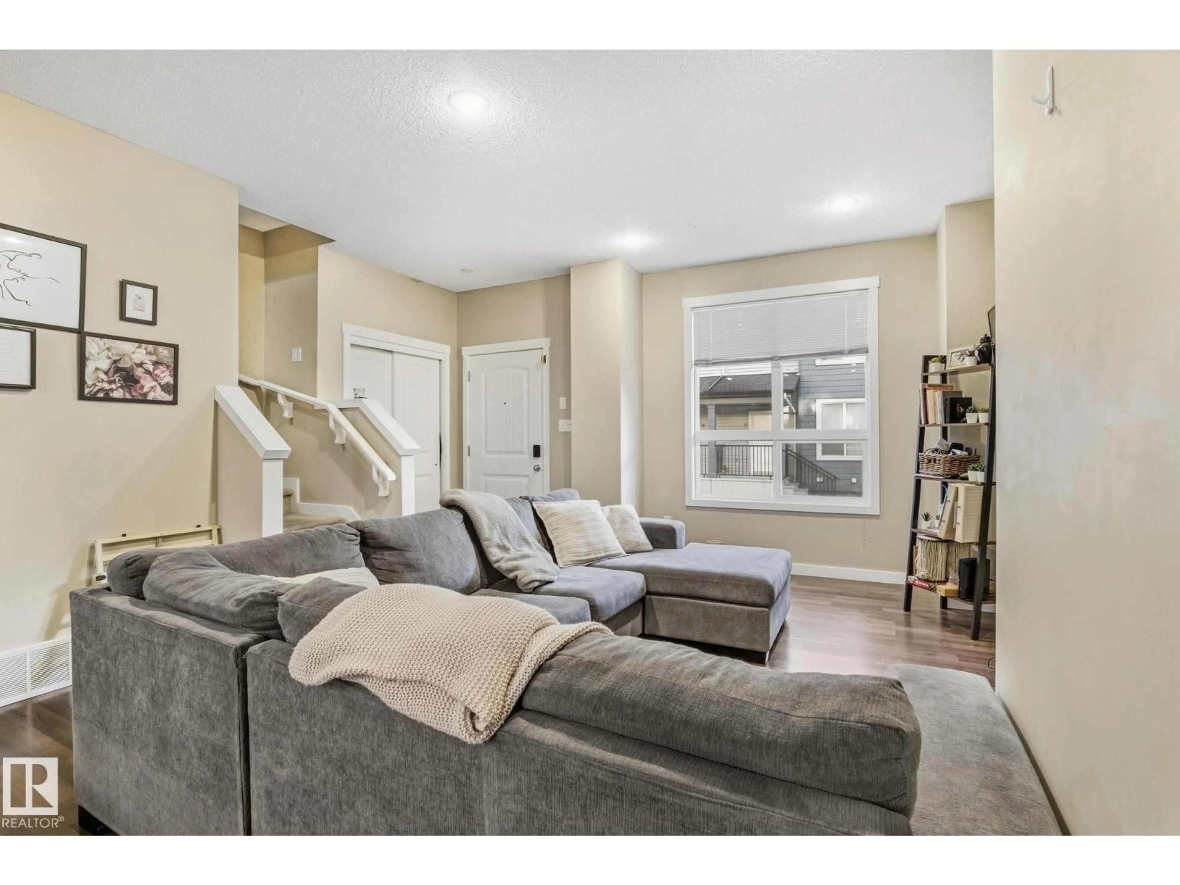 Living room with furniture, unknown for #30 - 6075 SCHONSEE WY, Edmonton Alberta T5Z0H4