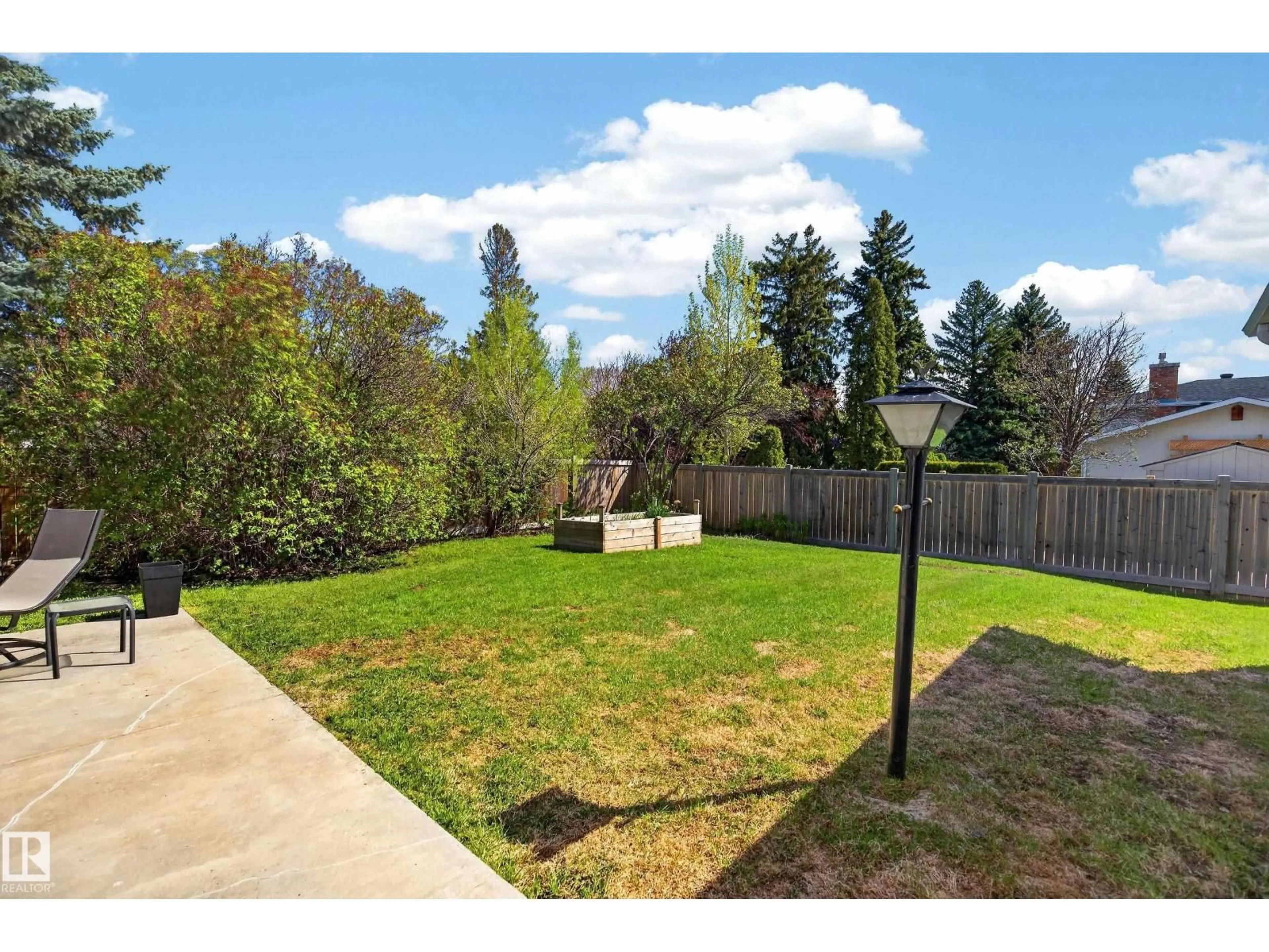 A pic from outside/outdoor area/front of a property/back of a property/a pic from drone, forest/trees view for 14108 47 AV, Edmonton Alberta T6H0B7