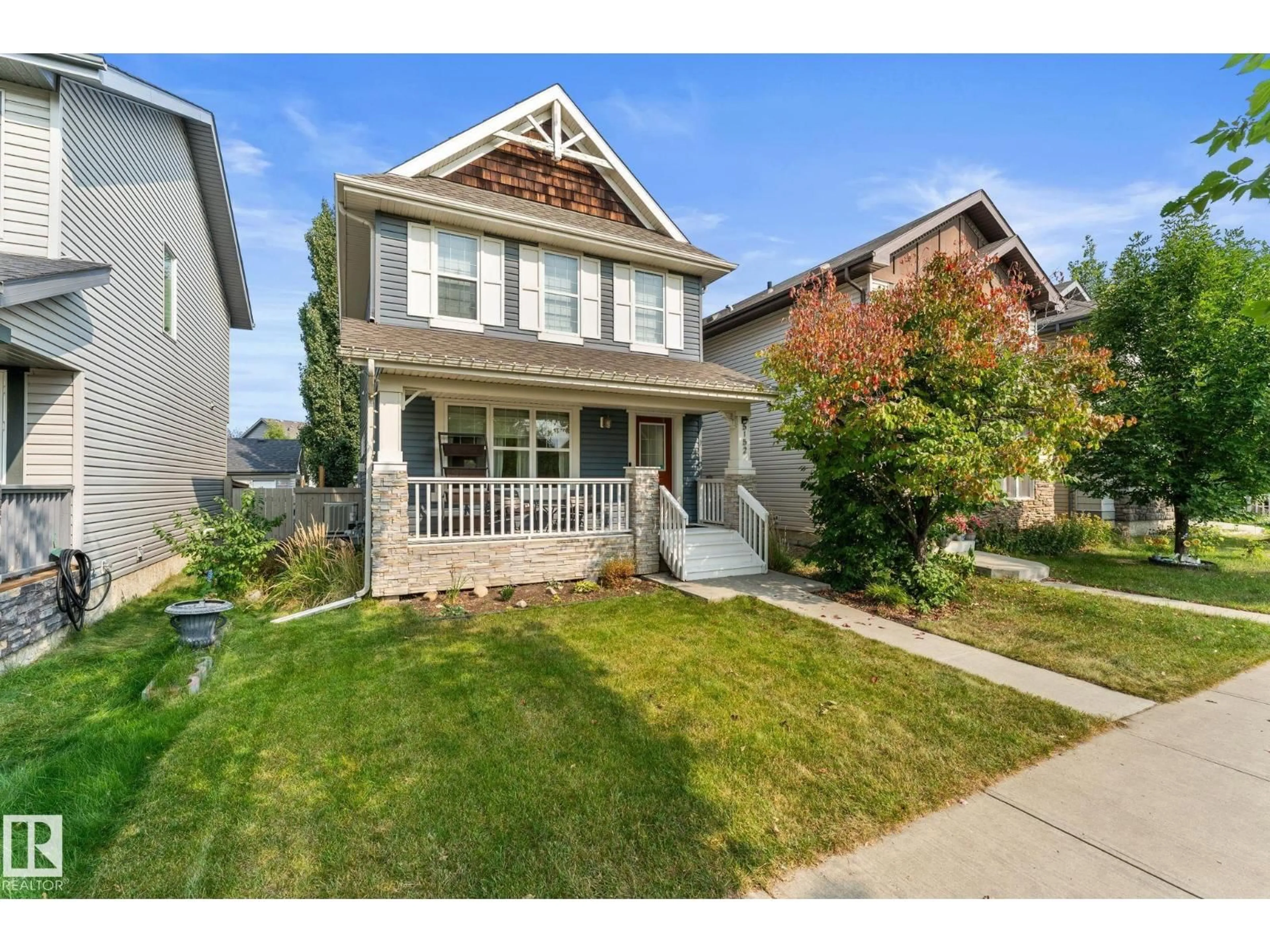 Home with vinyl exterior material, street for 5152 4 AV, Edmonton Alberta T6X0R2