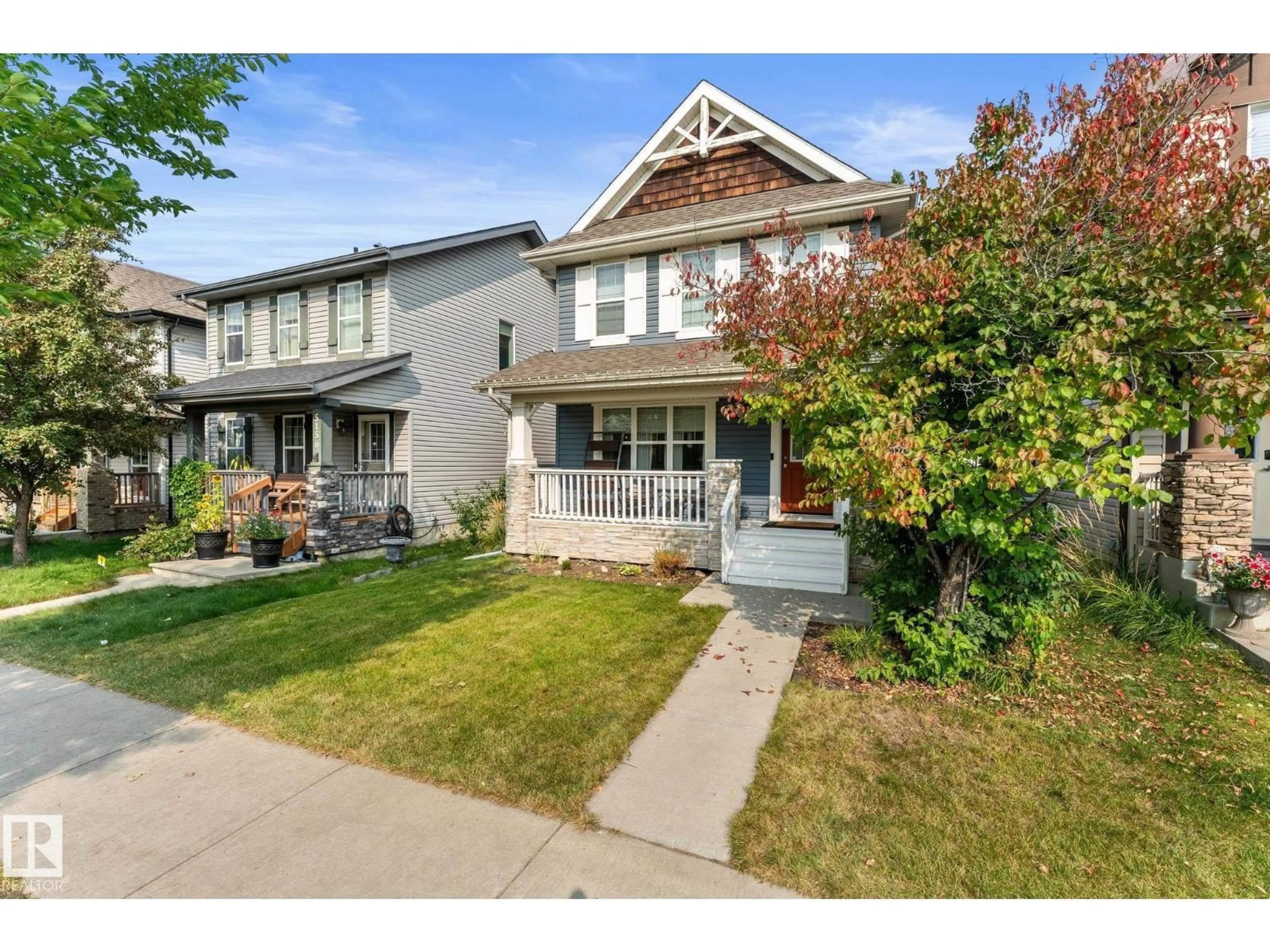 Home with vinyl exterior material, street for 5152 4 AV, Edmonton Alberta T6X0R2
