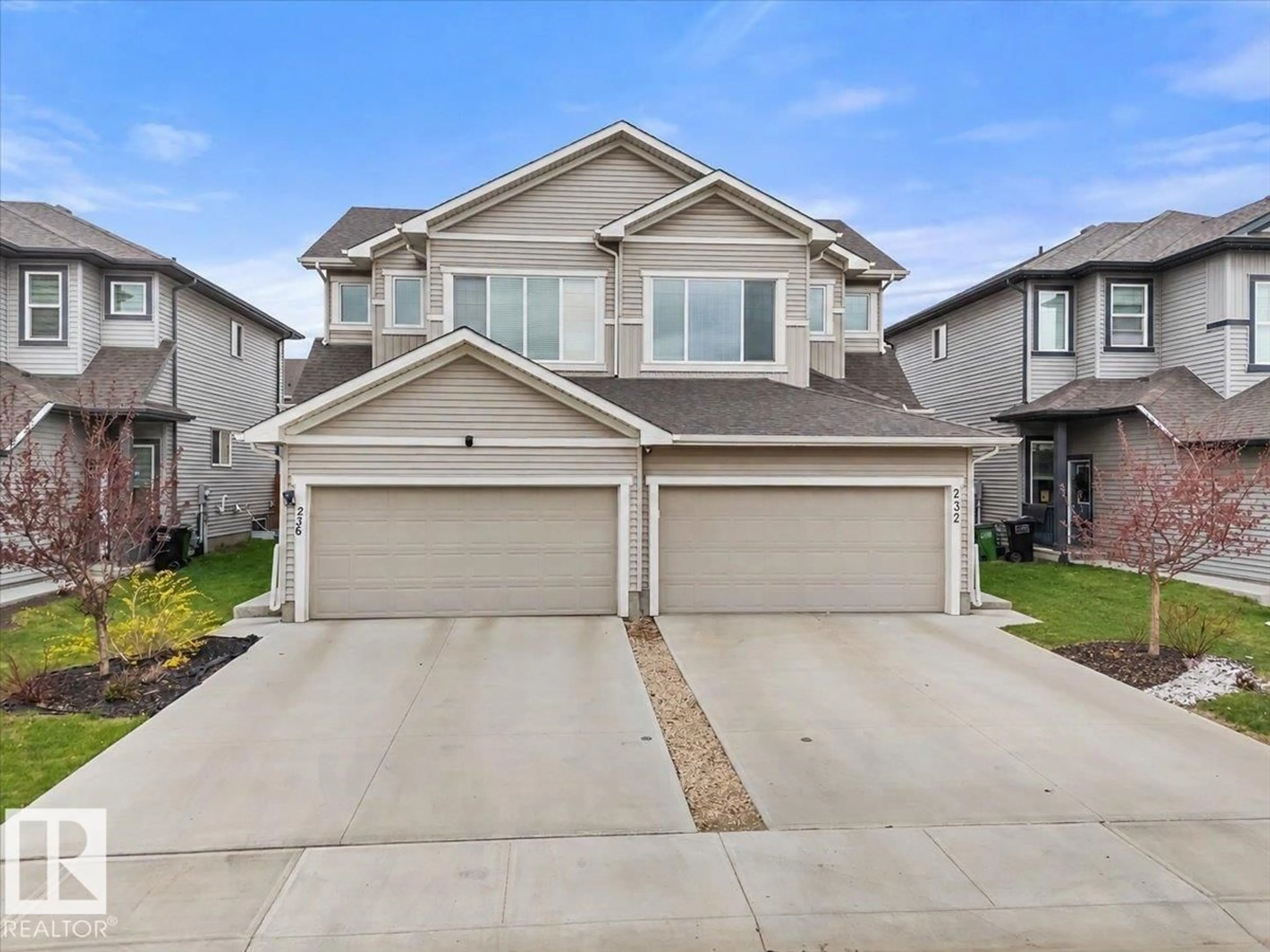 Home with vinyl exterior material, street for 236 39 AV NW, Edmonton Alberta T6T2K3