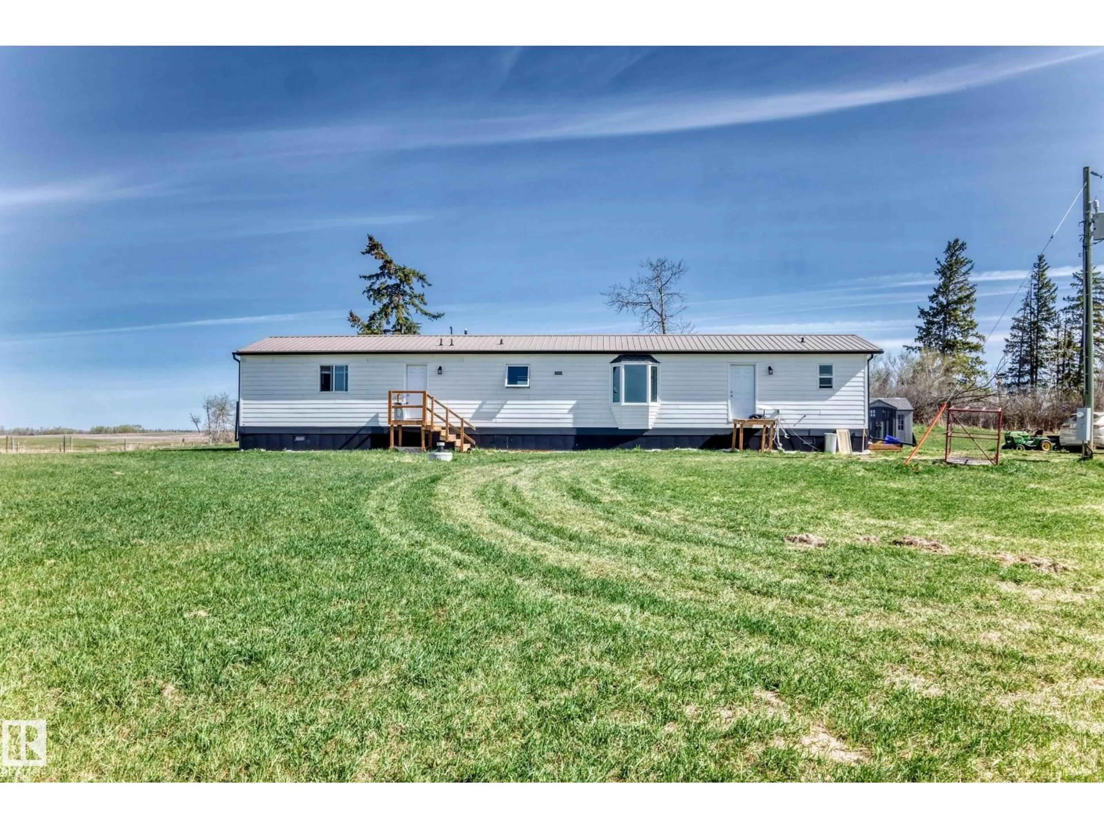 A pic from outside/outdoor area/front of a property/back of a property/a pic from drone, water/lake/river/ocean view for 56432 HWY 777, Rural Barrhead County Alberta T7N0L6