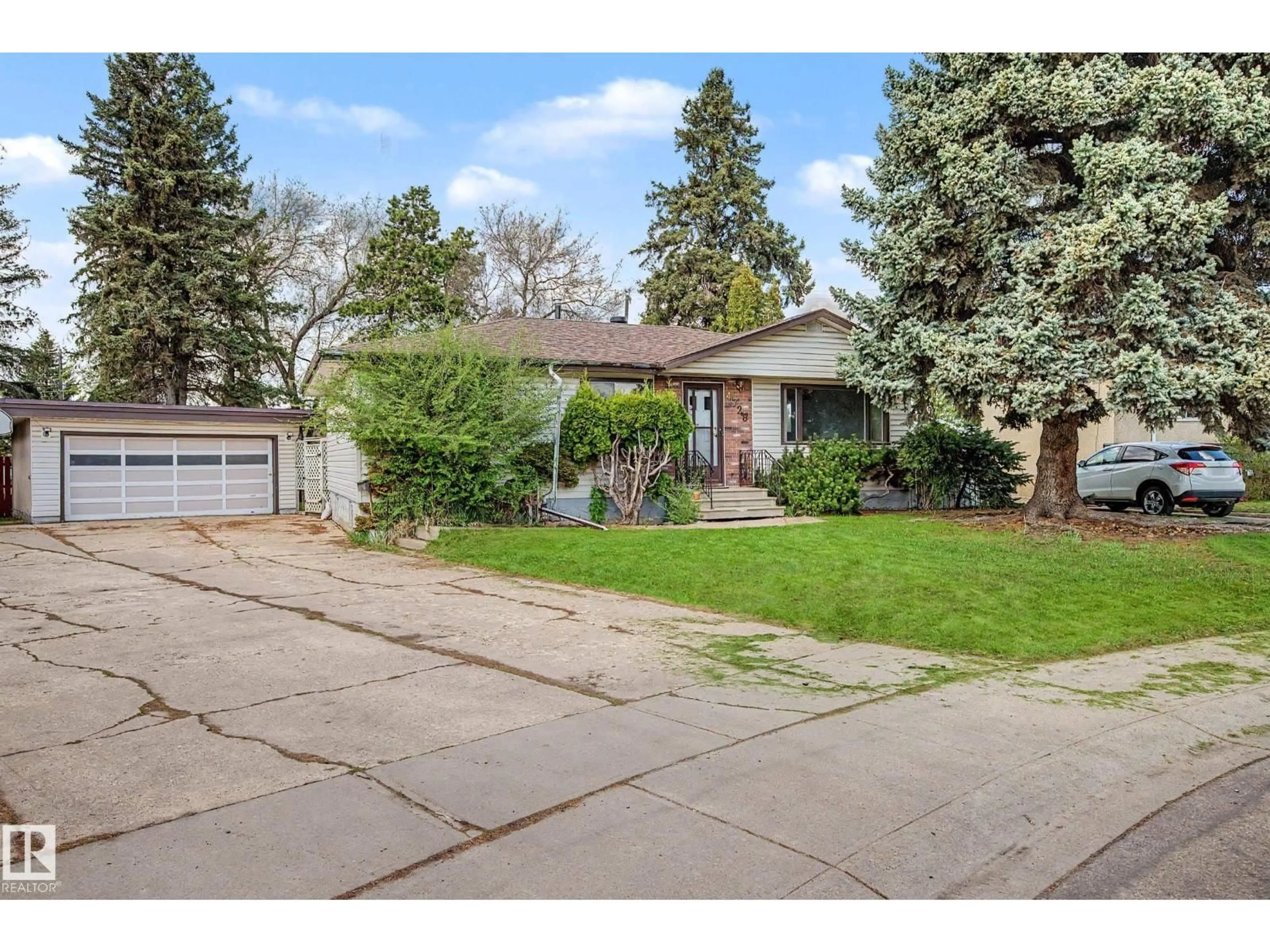 Home with brick exterior material, street for 4728 102A AV, Edmonton Alberta T6A0R1