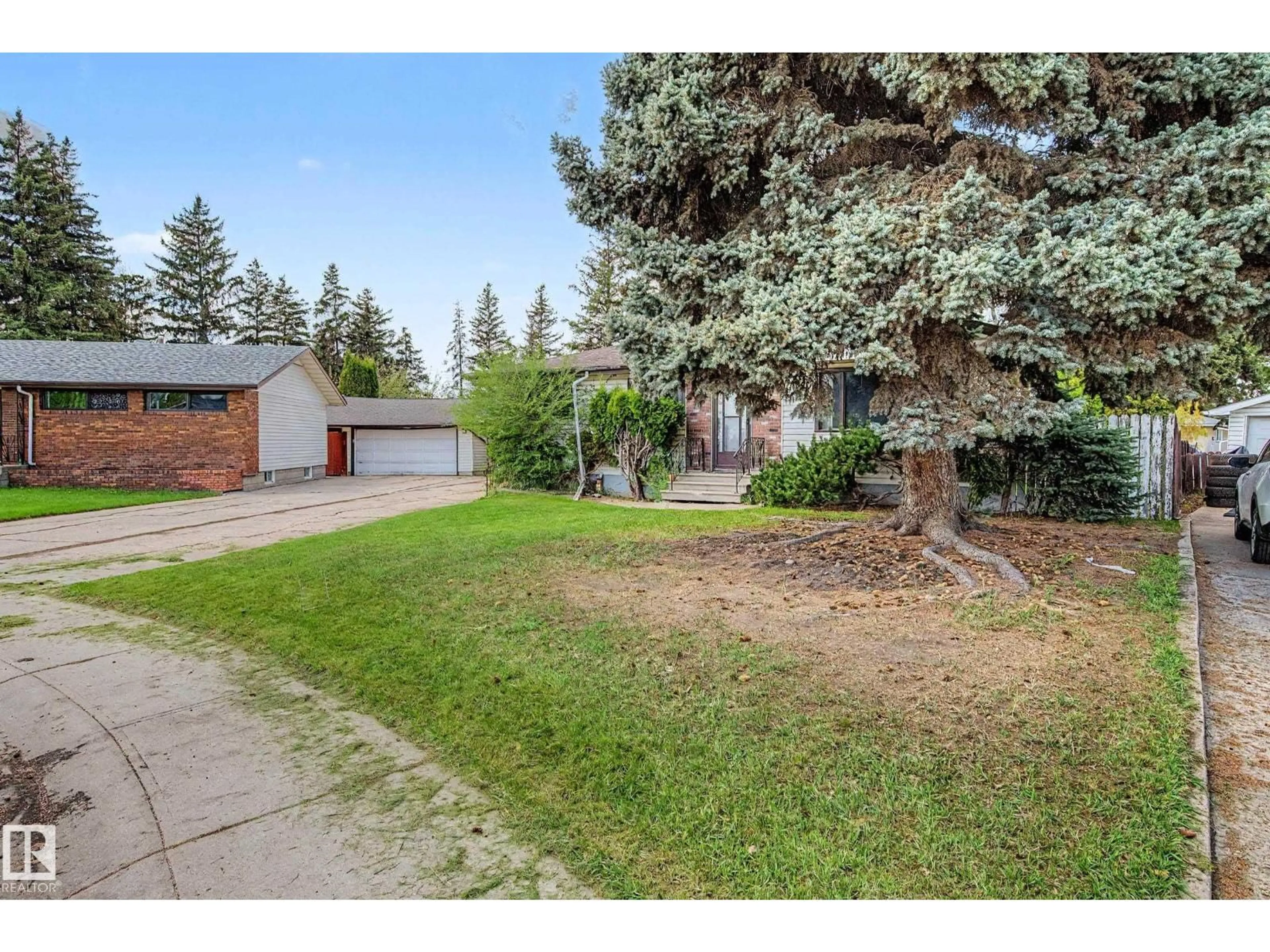 A pic from outside/outdoor area/front of a property/back of a property/a pic from drone, street for 4728 102A AV, Edmonton Alberta T6A0R1