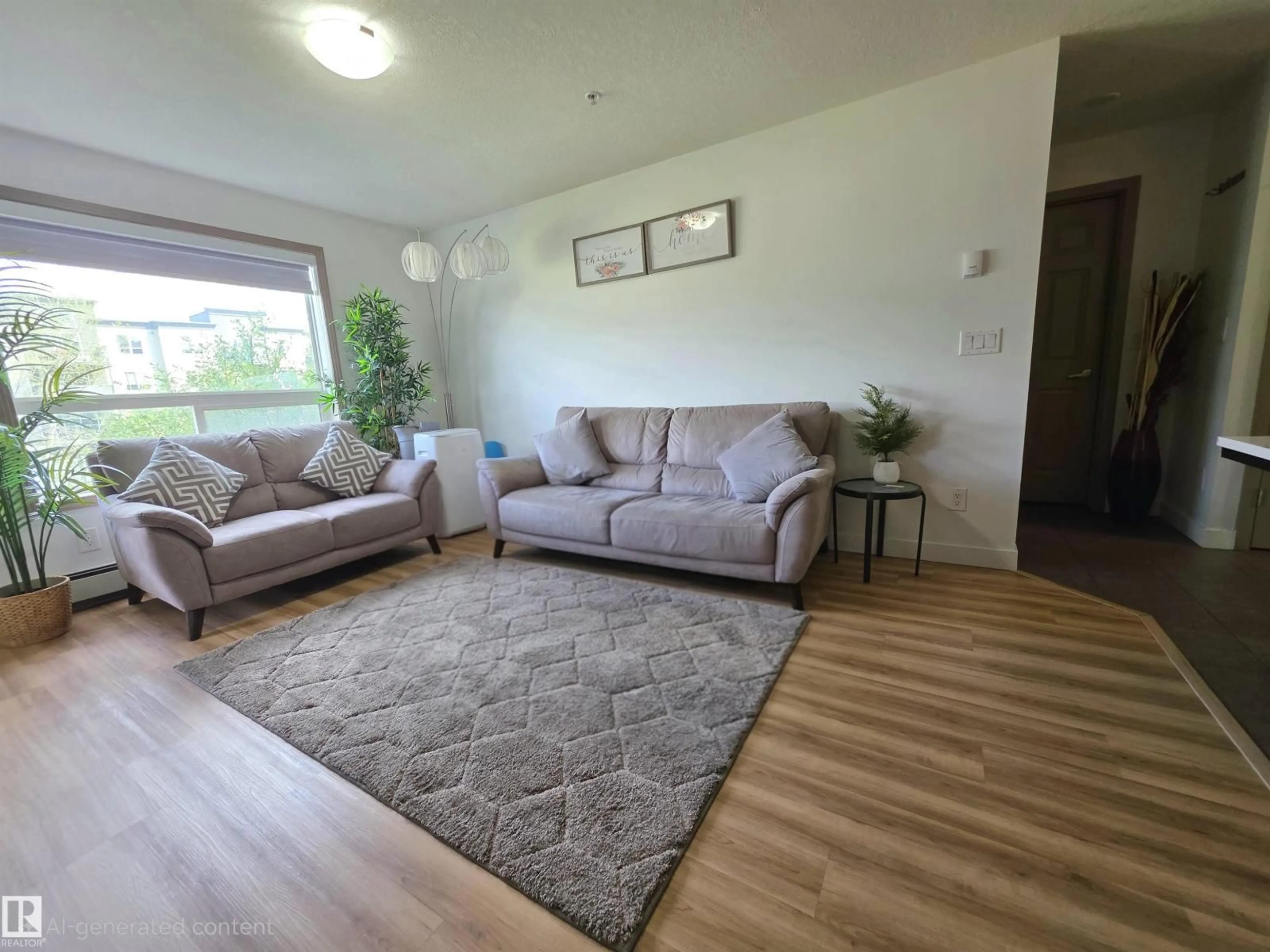 Living room with furniture, unknown for 210 - 5005 165 AV, Edmonton Alberta T5Y0L8
