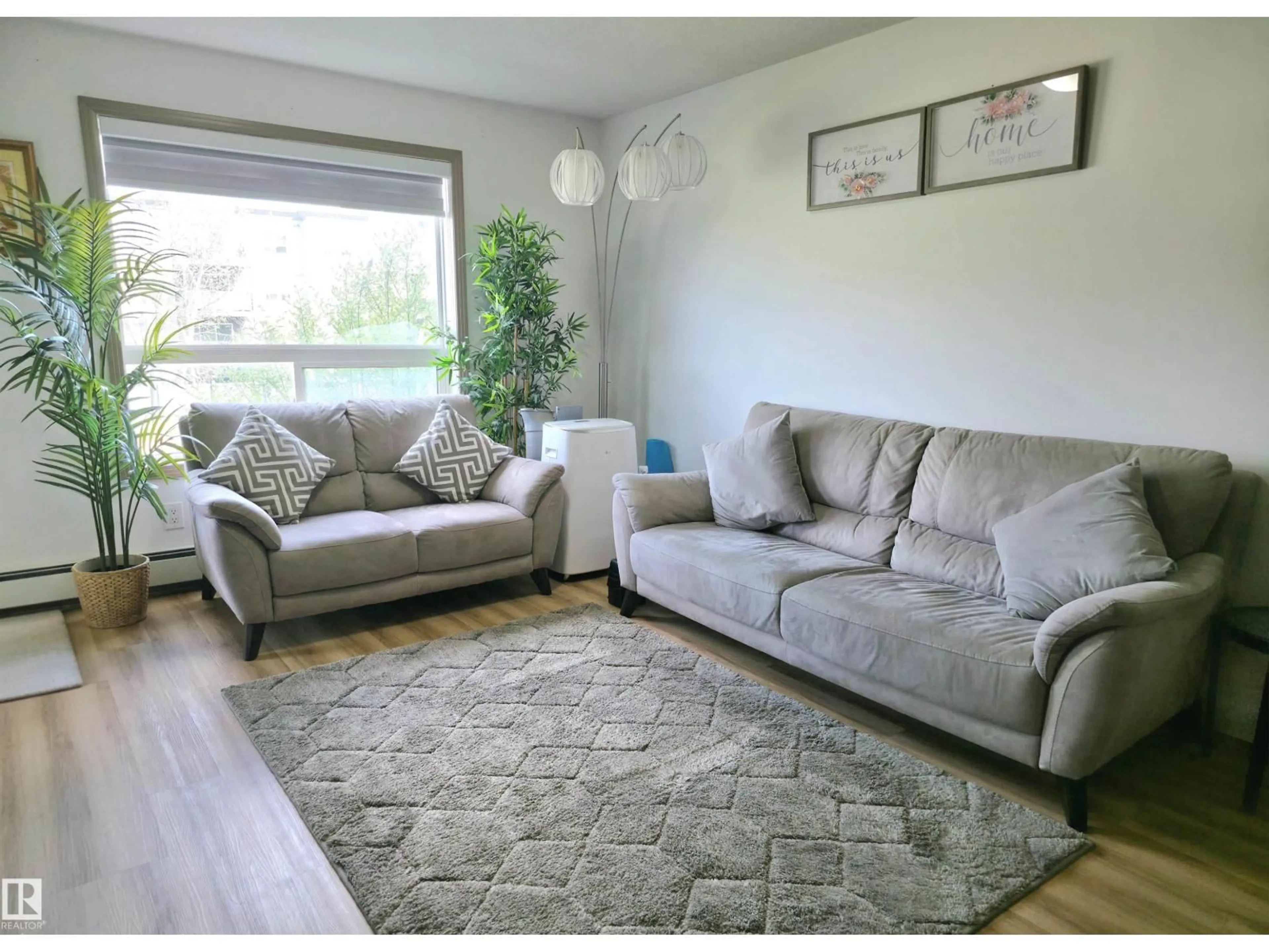 Living room with furniture, unknown for 210 - 5005 165 AV, Edmonton Alberta T5Y0L8