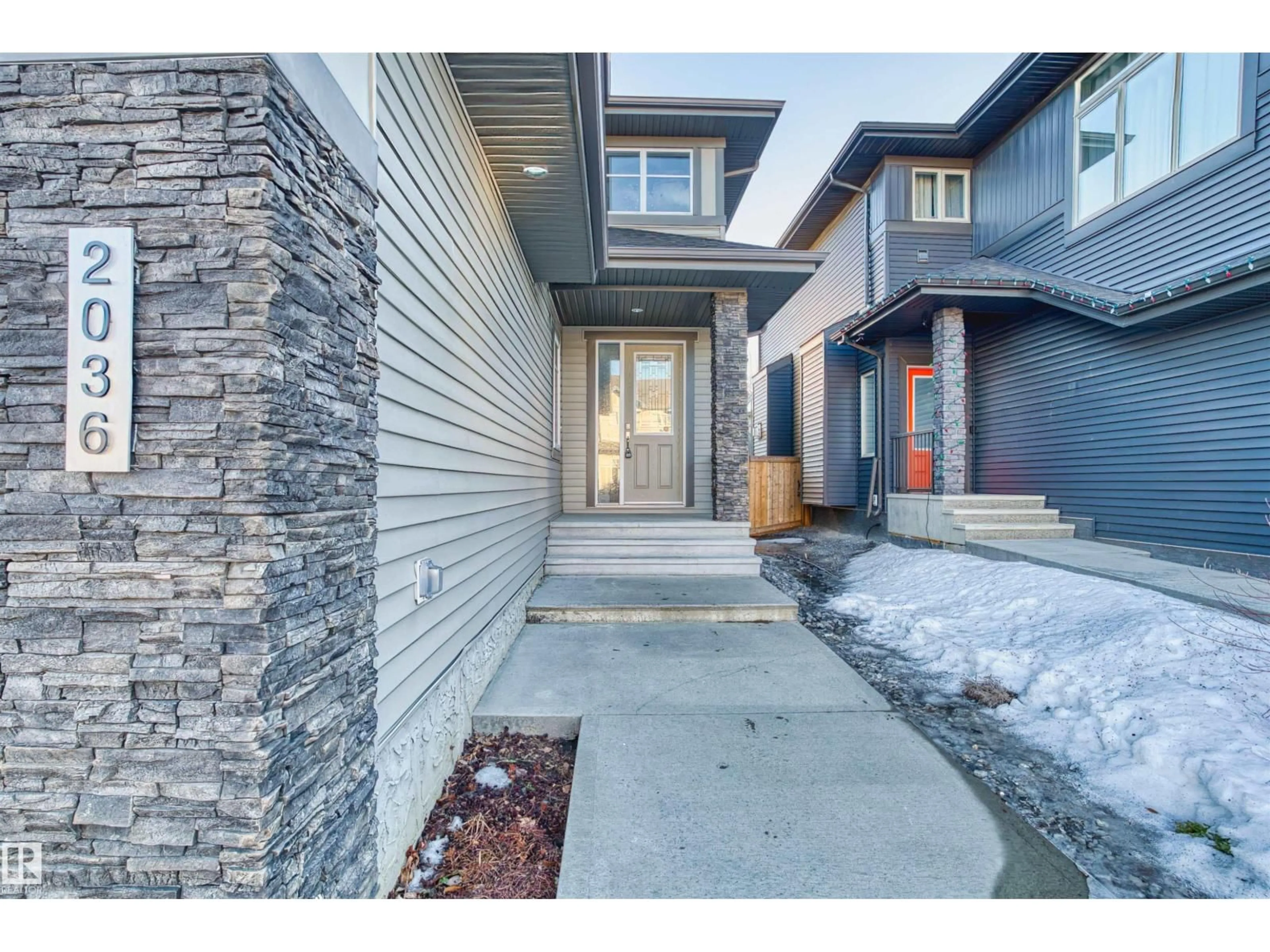 Home with brick exterior material, street for LI SW - 2036 AINSLIE LINK, Edmonton Alberta T6W2M2