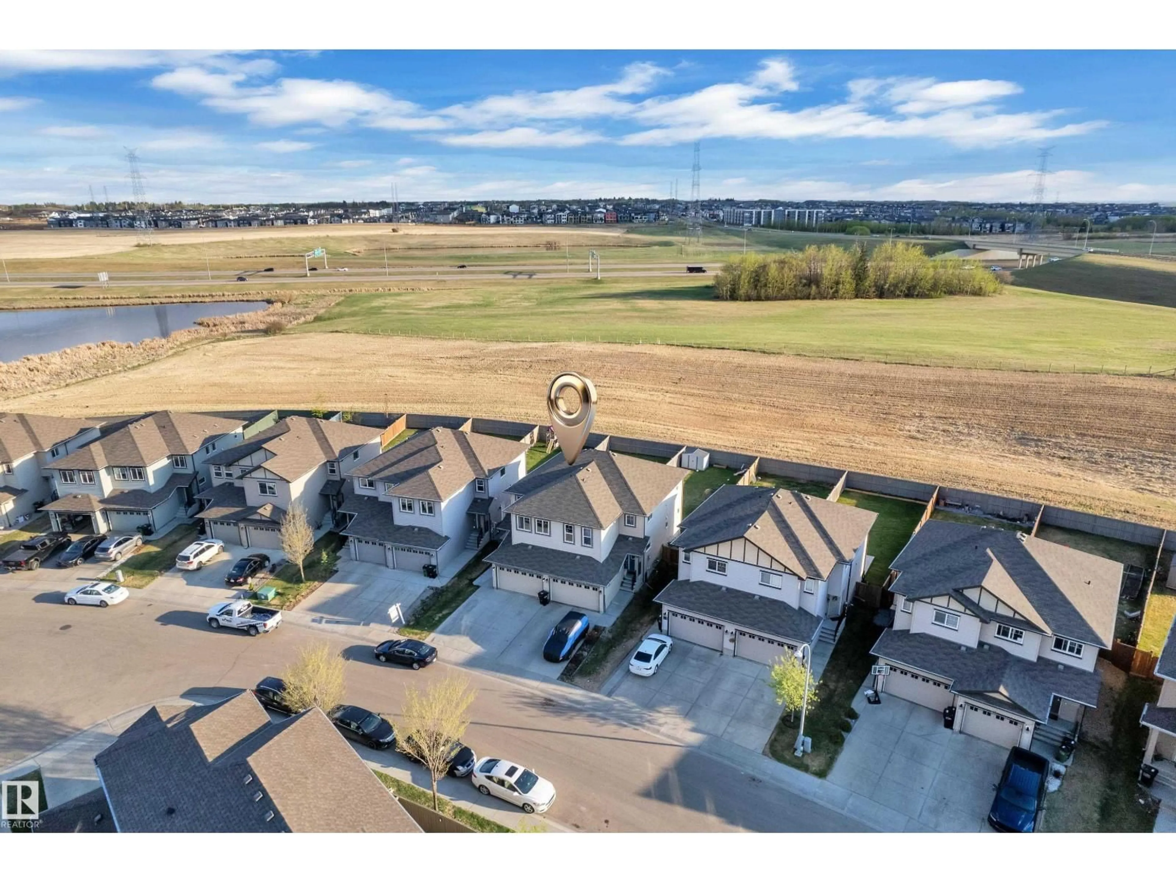 A pic from outside/outdoor area/front of a property/back of a property/a pic from drone, water/lake/river/ocean view for 3319 11 AV, Edmonton Alberta T6L2L5