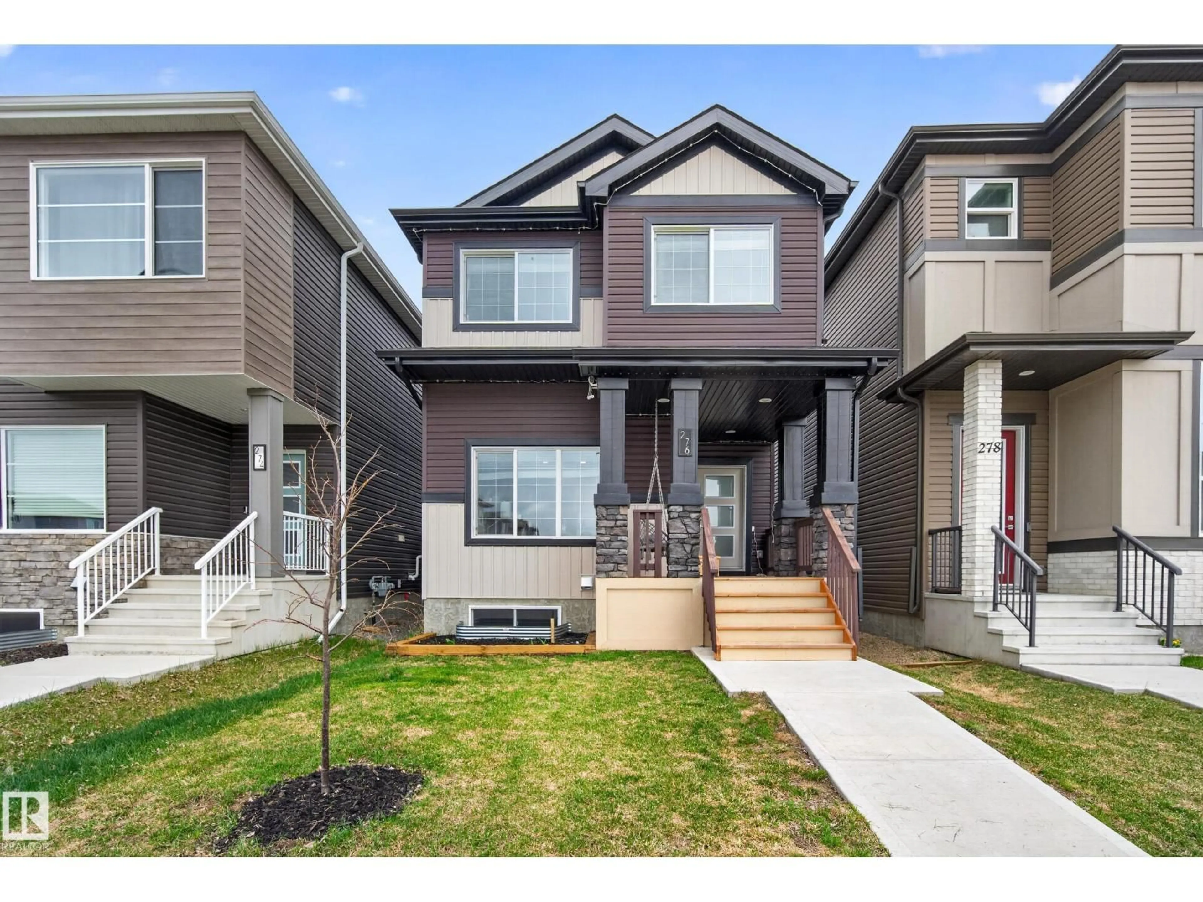 Home with vinyl exterior material, street for 276 ROLSTON WD, Leduc Alberta T9E1L1