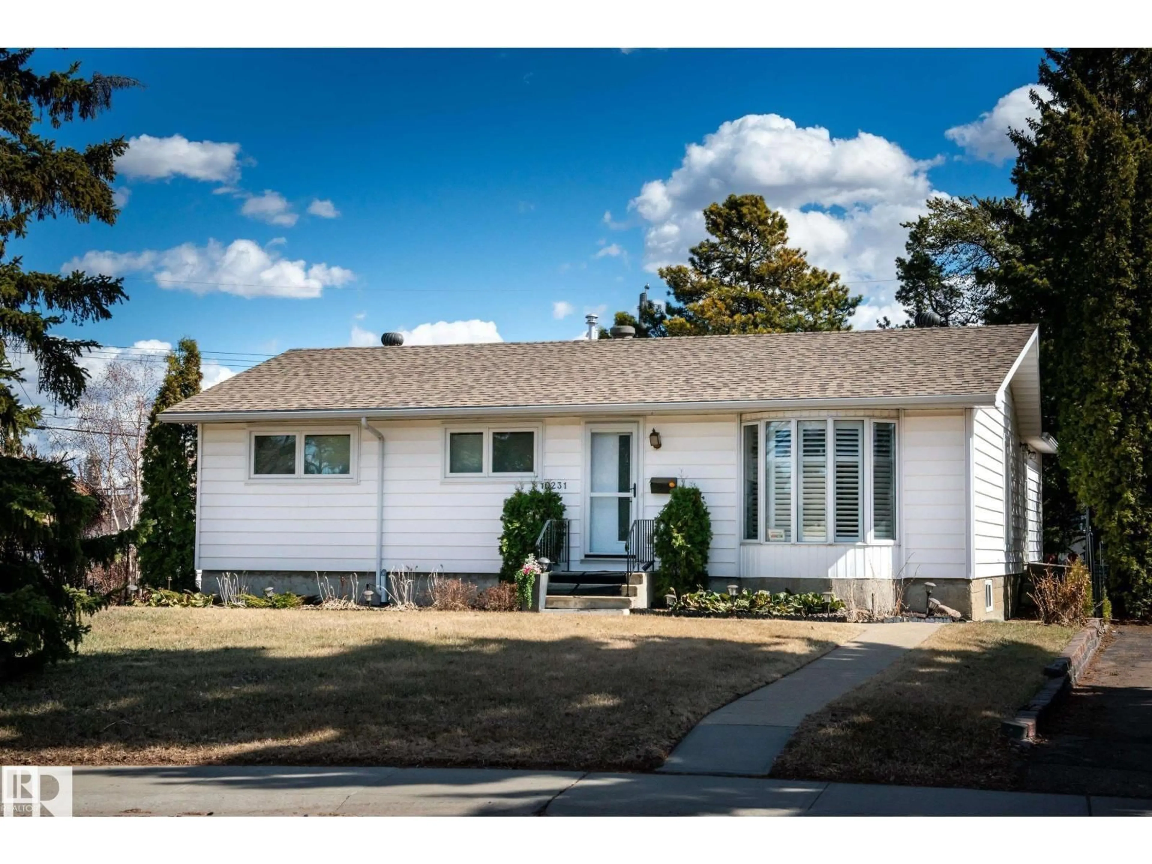 Home with vinyl exterior material, street for 10231 46 ST, Edmonton Alberta T6A1X9