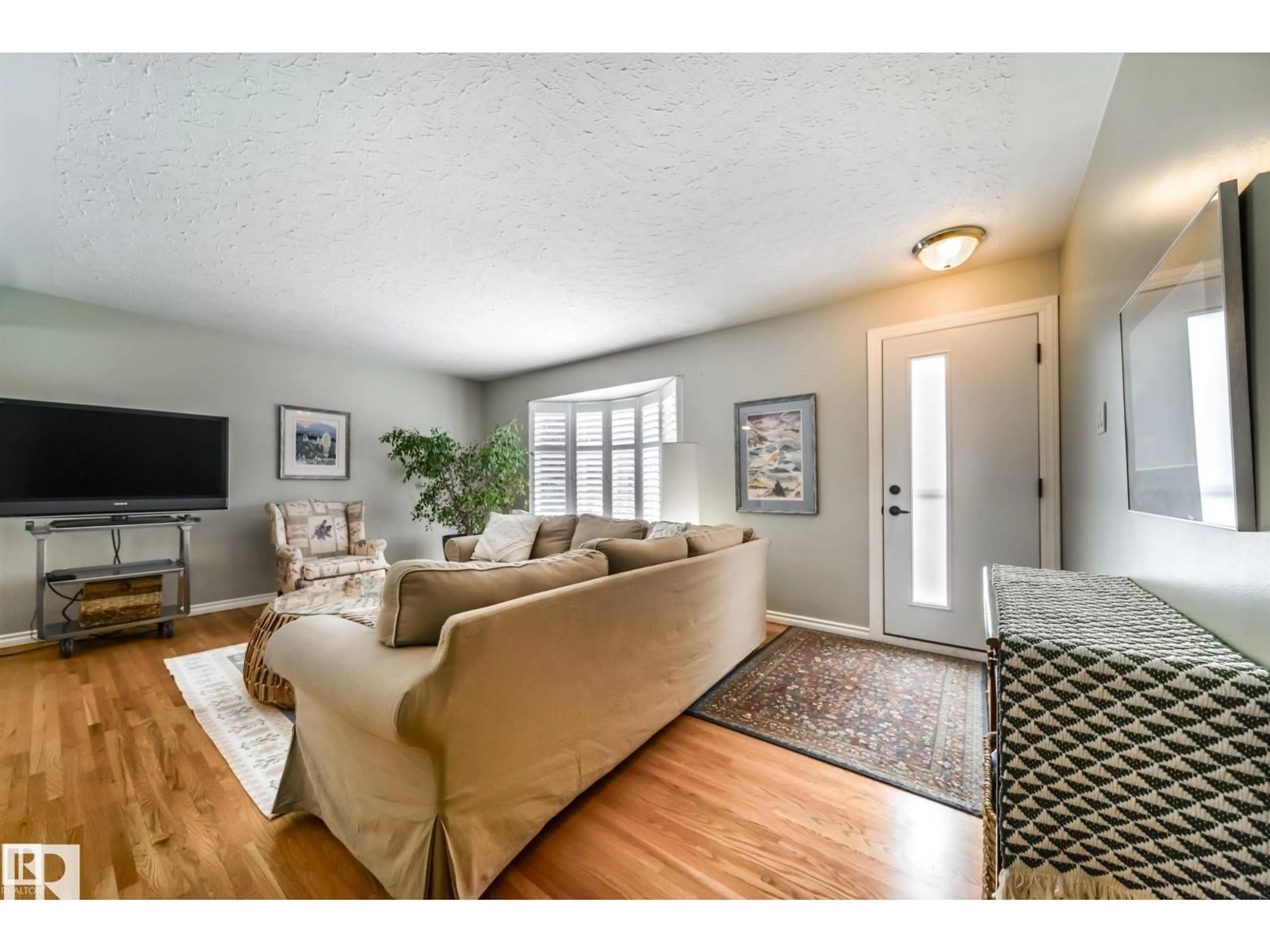 Living room with furniture, unknown for 10231 46 ST, Edmonton Alberta T6A1X9