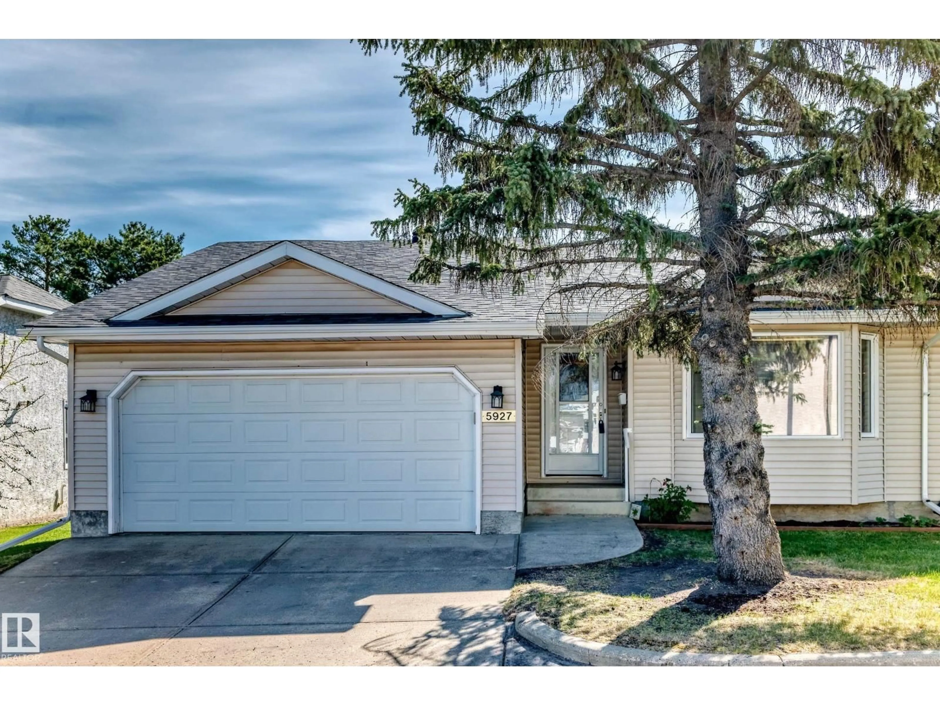 Home with vinyl exterior material, street for NW - 5927 189 ST, Edmonton Alberta T6M2J1