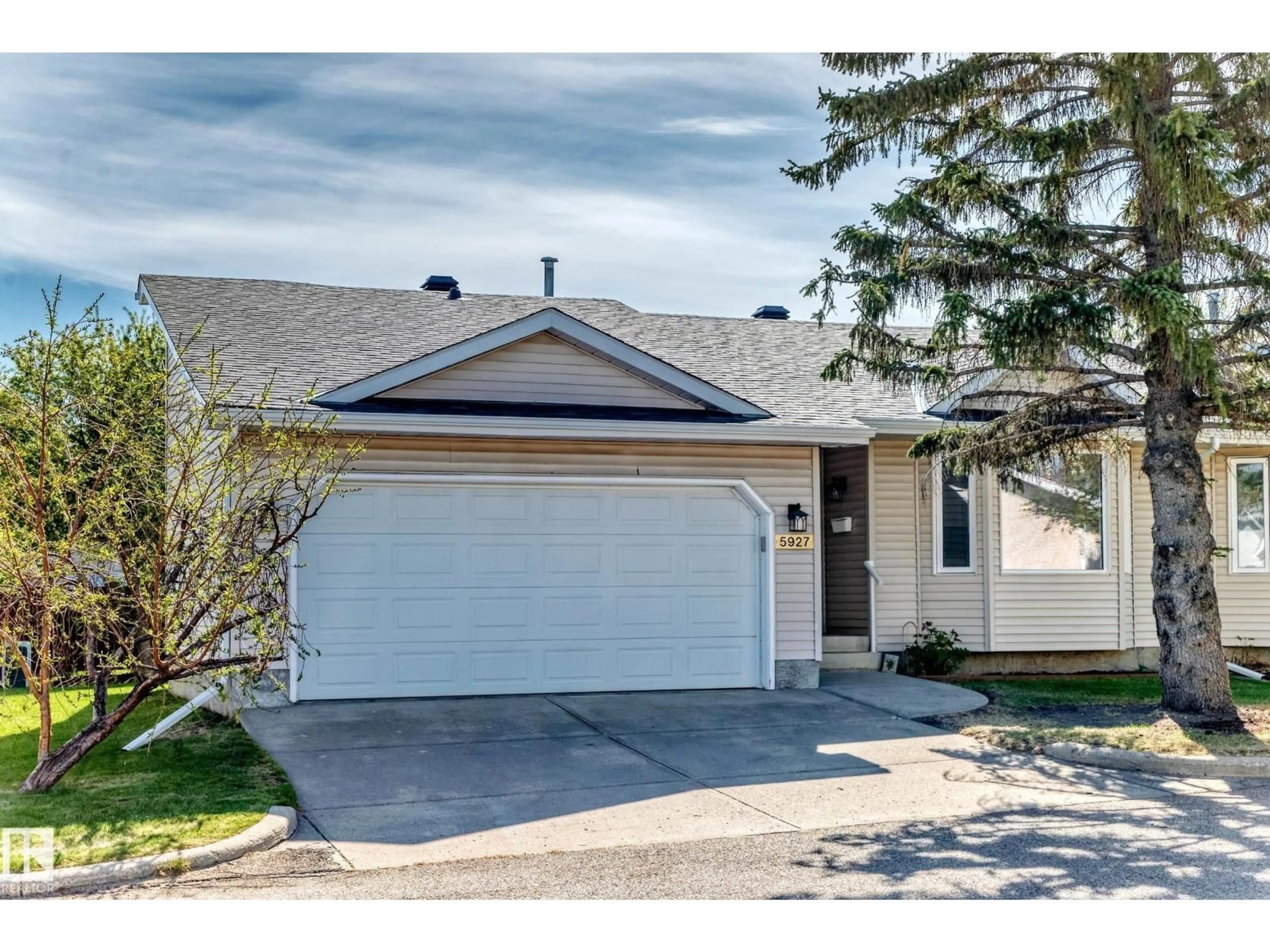 Home with vinyl exterior material, street for NW - 5927 189 ST, Edmonton Alberta T6M2J1