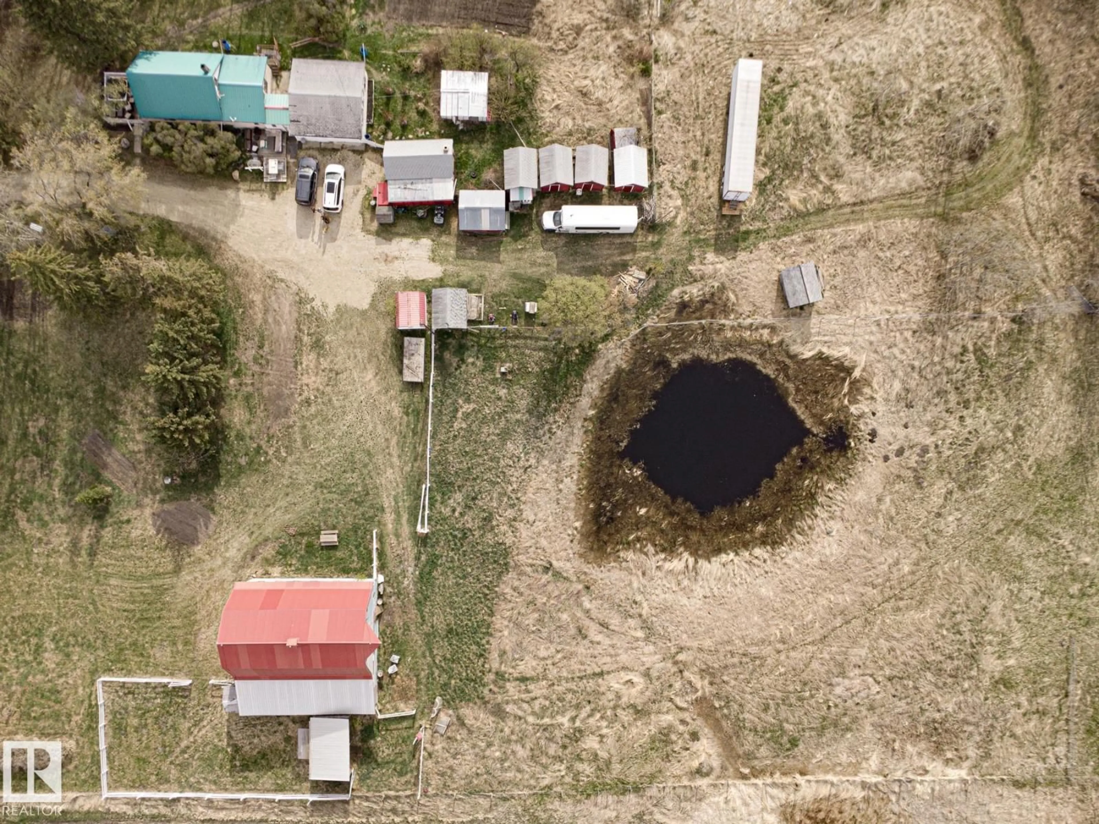A pic from outside/outdoor area/front of a property/back of a property/a pic from drone, street for 2409 HWY 633 NW, Rural Lac Ste. Anne County Alberta T0E0J0