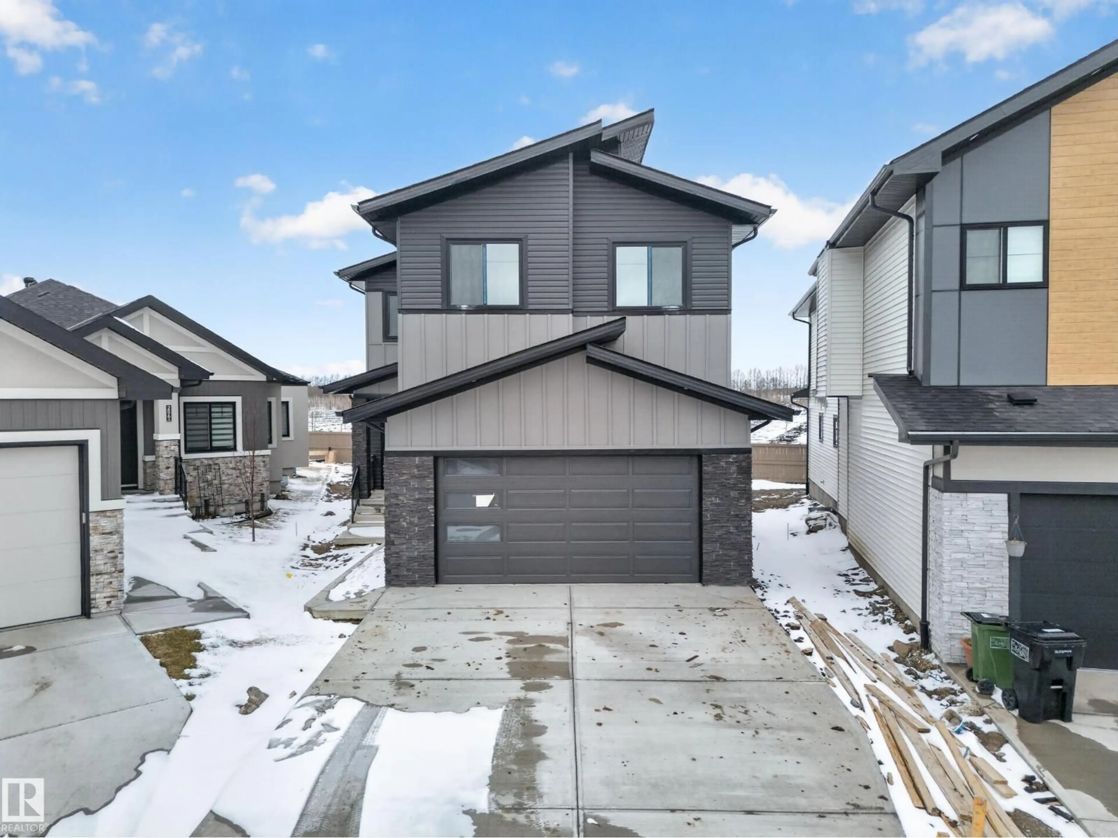 A pic from outside/outdoor area/front of a property/back of a property/a pic from drone, street for NE - 260 166 AV, Edmonton Alberta T5Y4J2