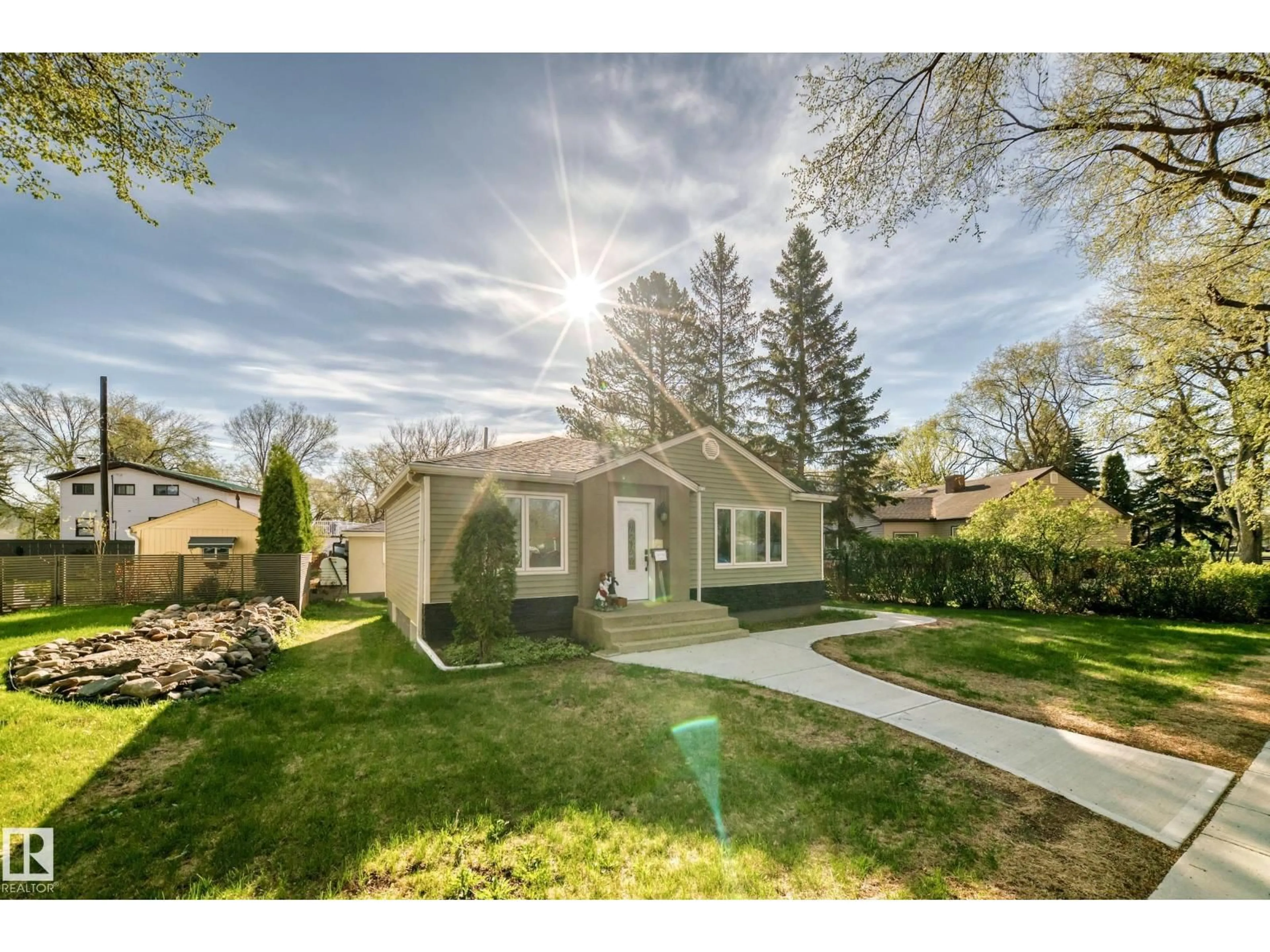 A pic from outside/outdoor area/front of a property/back of a property/a pic from drone, street for 11303 60 ST, Edmonton Alberta T5W3Z2