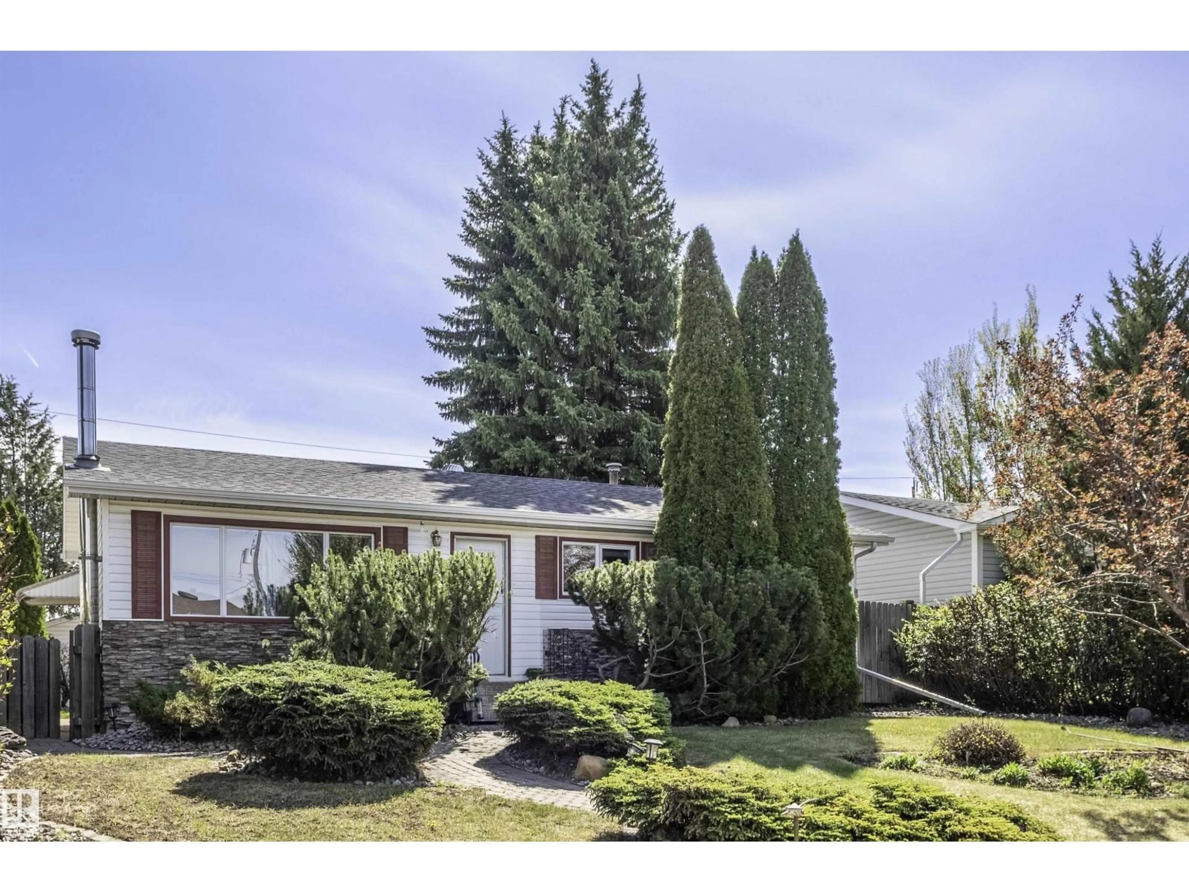 Home with vinyl exterior material, street for 9331 52 ST, Edmonton Alberta T6B1G5