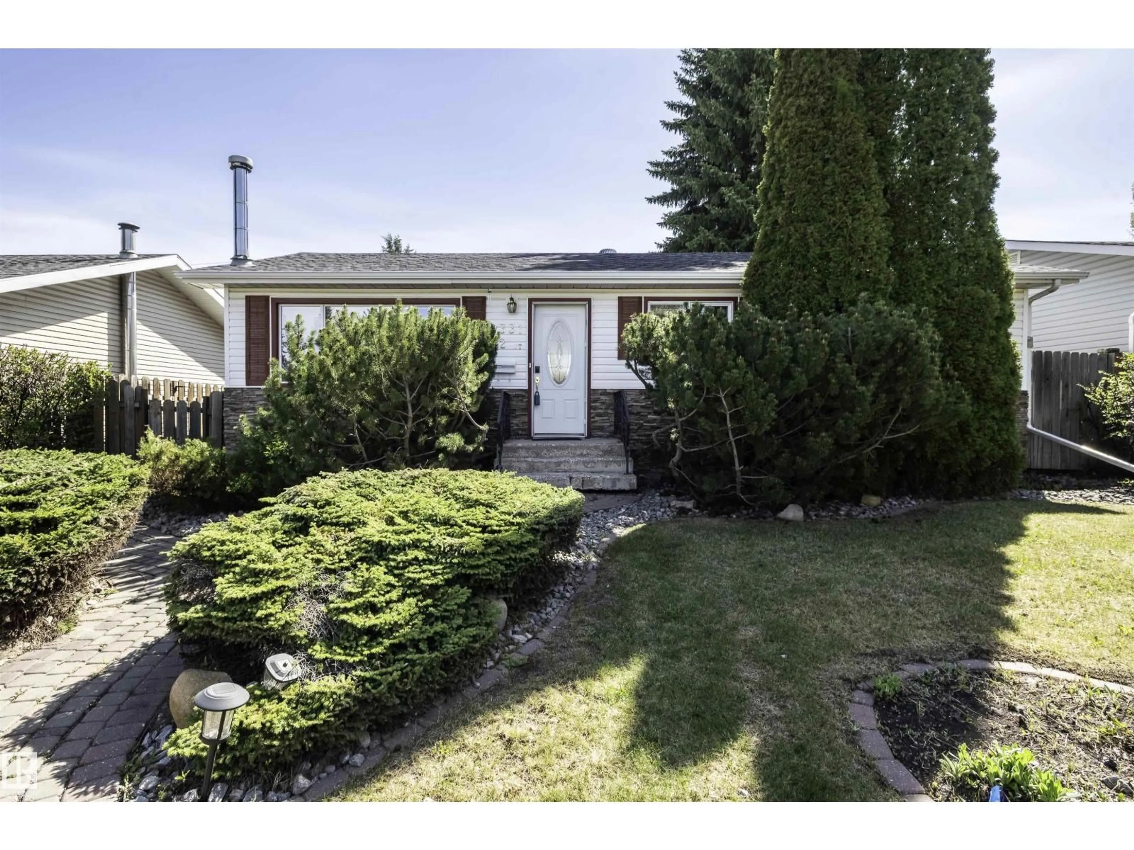 Home with vinyl exterior material, street for 9331 52 ST, Edmonton Alberta T6B1G5