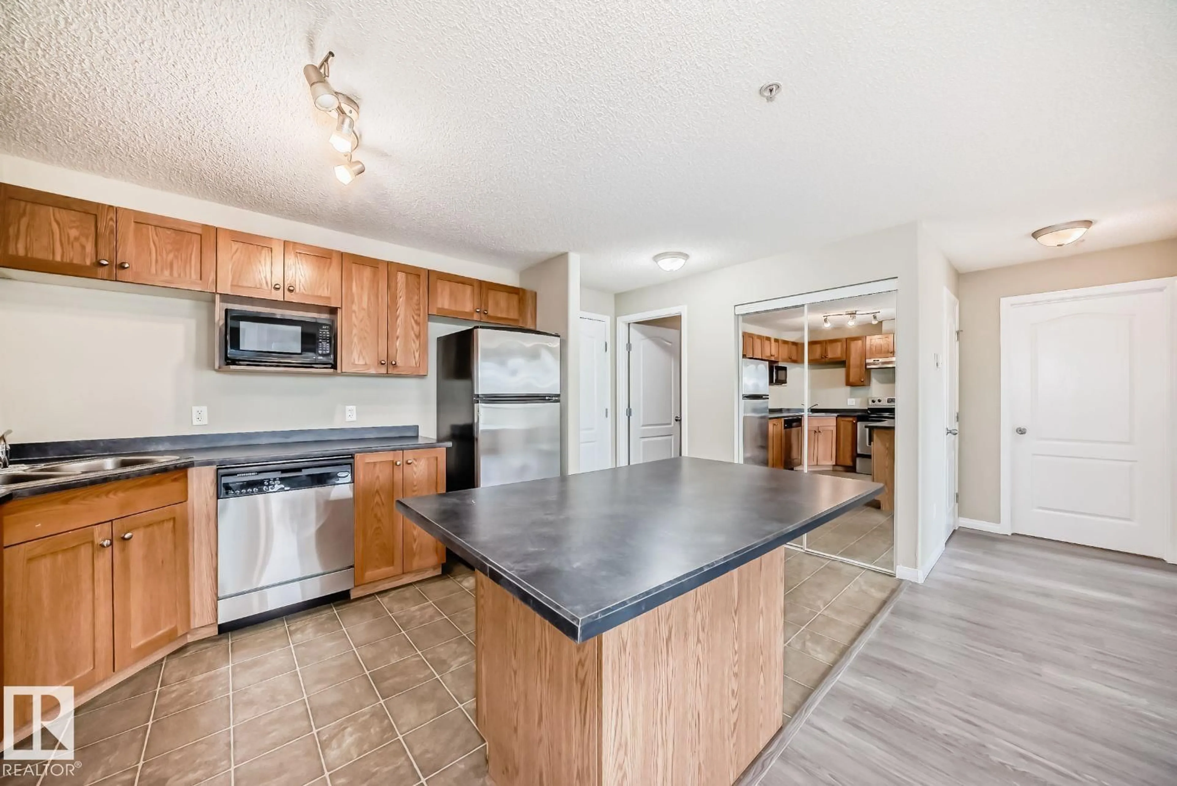 Open concept kitchen, unknown for 1315 CLAREVIEW STATION DR, Edmonton Alberta T5Y0E6