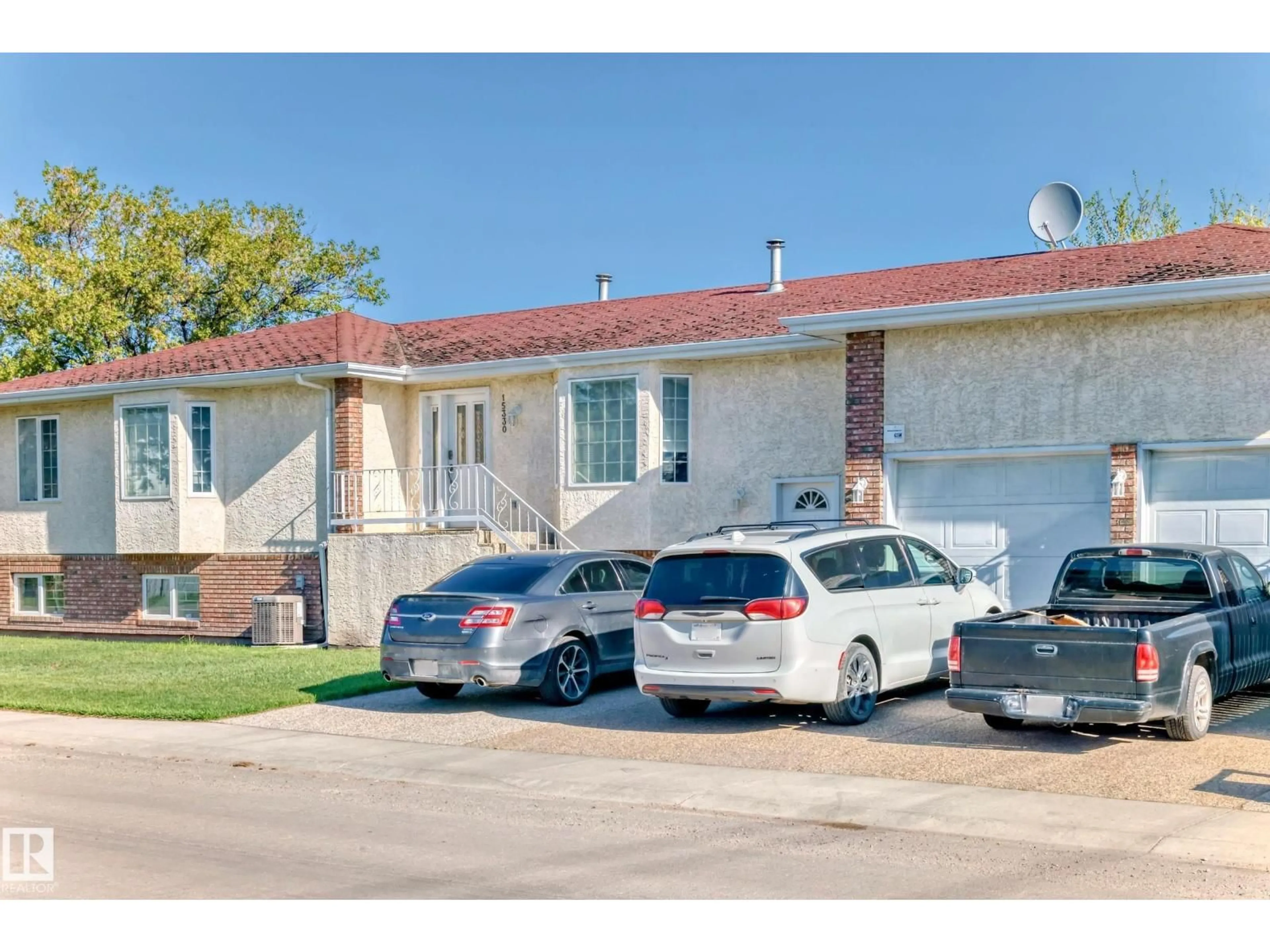 A pic from outside/outdoor area/front of a property/back of a property/a pic from drone, street for 15330 99 AV, Edmonton Alberta T5P0H9