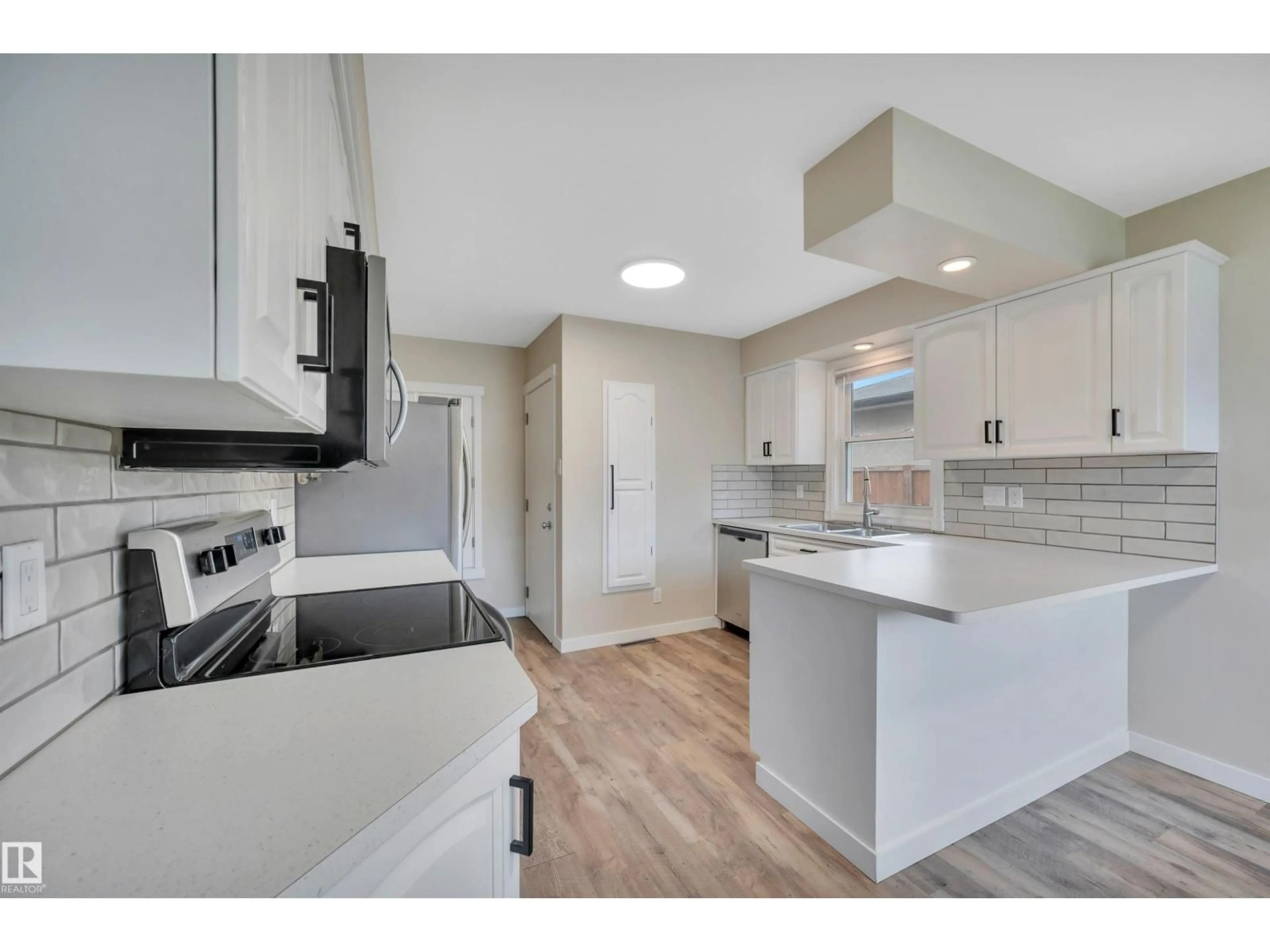 Open concept kitchen, unknown for NW - 6515 104 A ST, Edmonton Alberta T6Y2M2