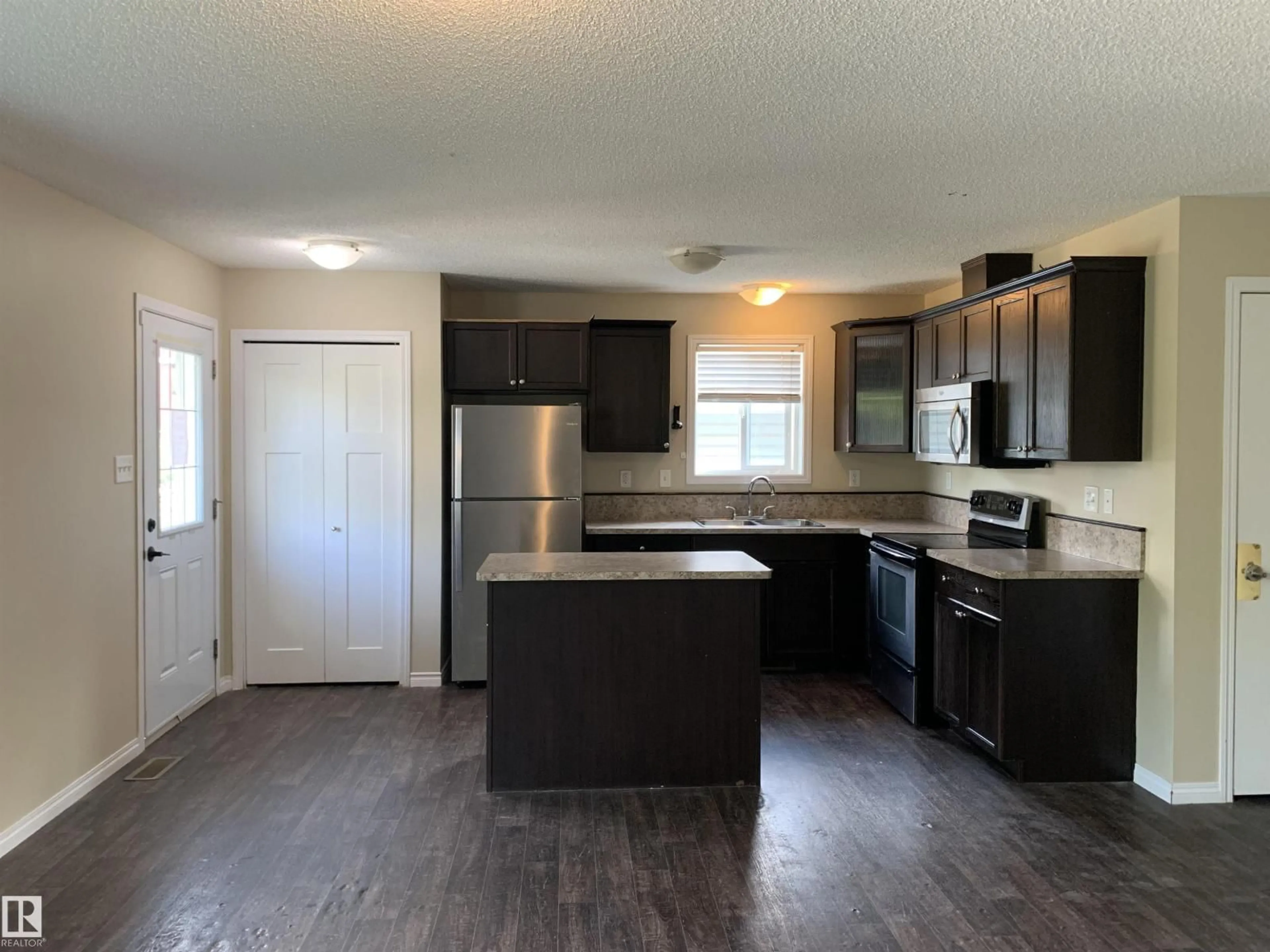 Open concept kitchen, unknown for NW - 11824 93 ST, Edmonton Alberta T5G1E3