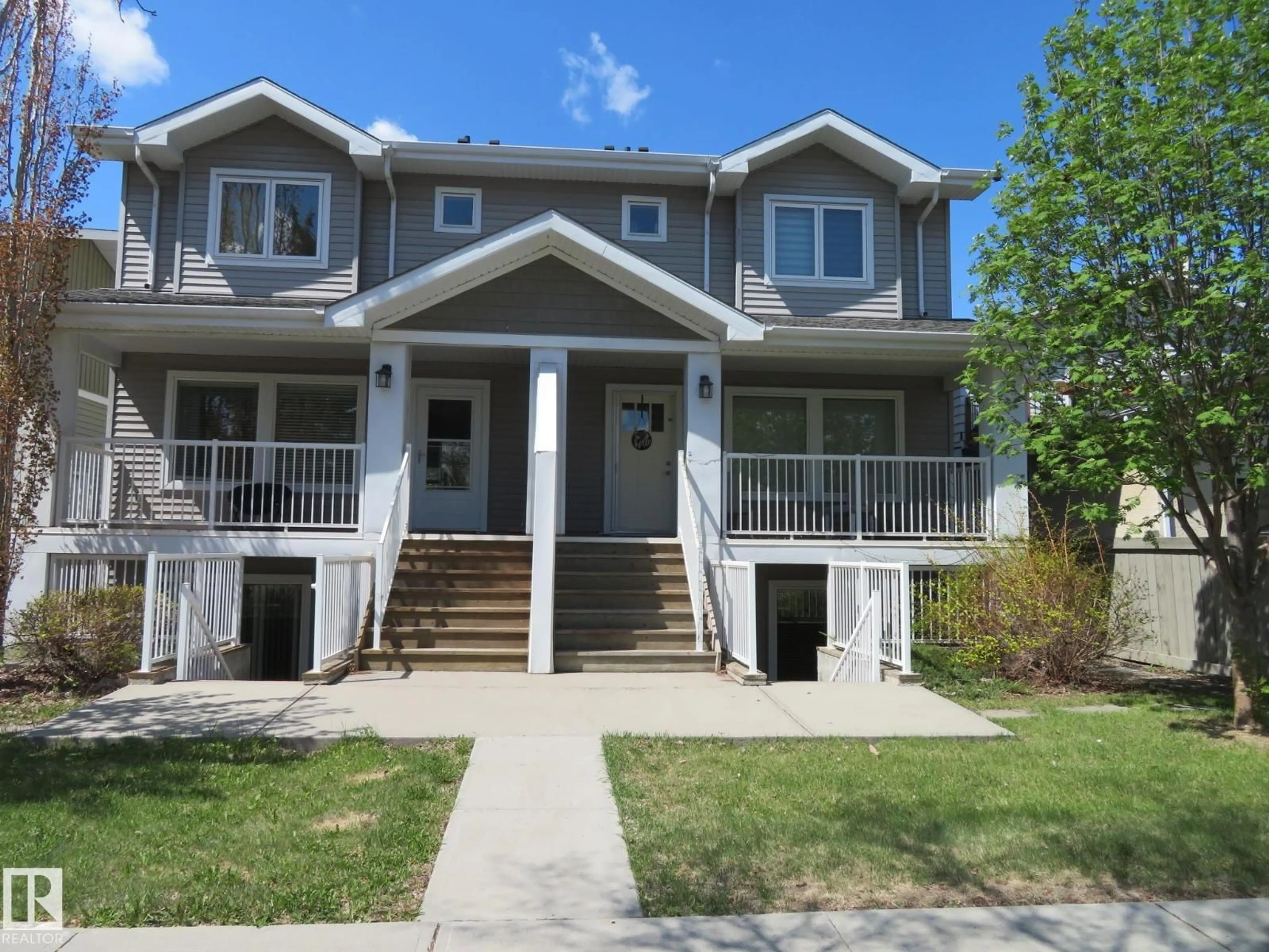Home with vinyl exterior material, street for 11840 112 ST, Edmonton Alberta T5L0C2