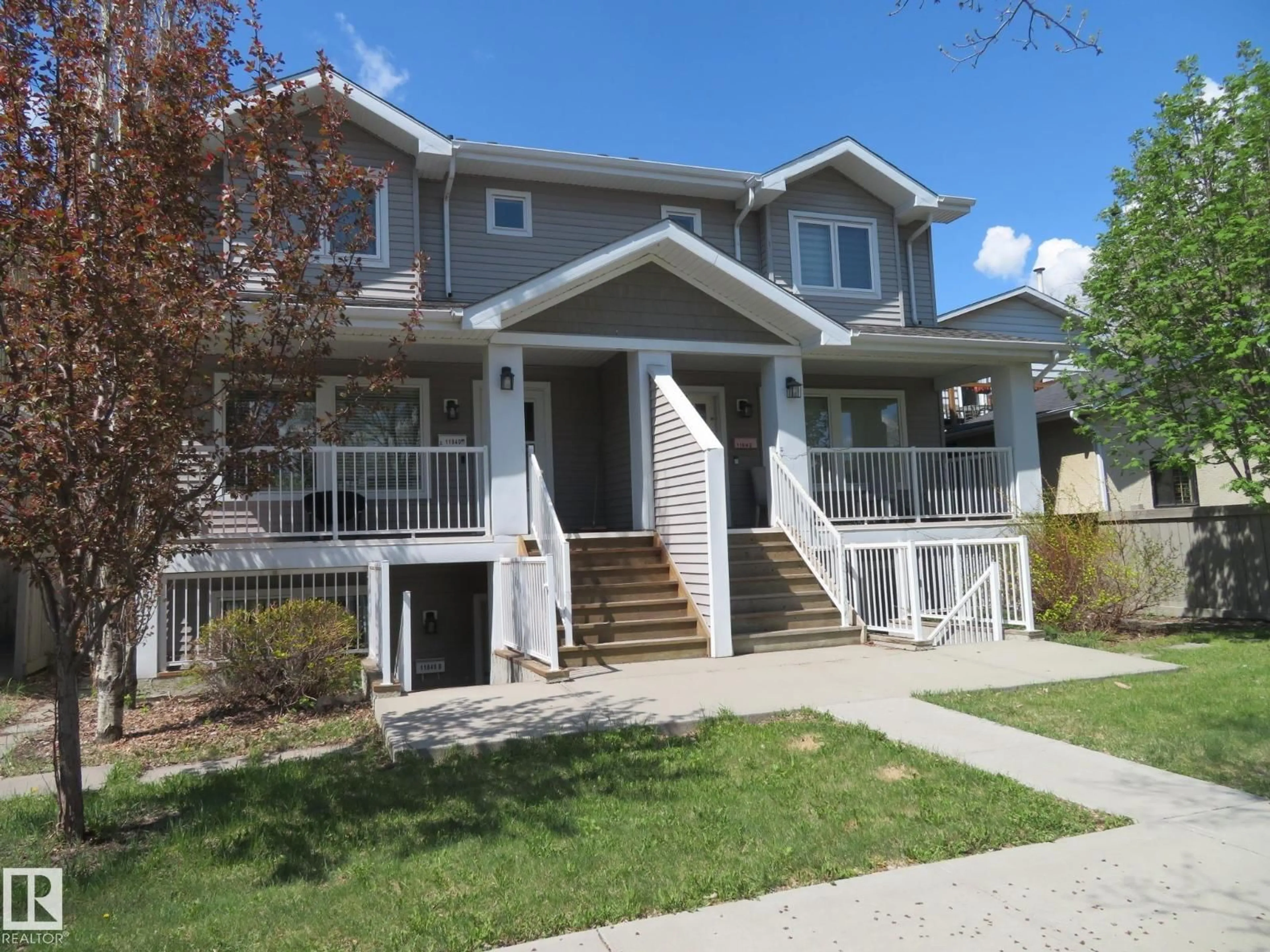 Home with vinyl exterior material, street for 11840 112 ST, Edmonton Alberta T5L0C2