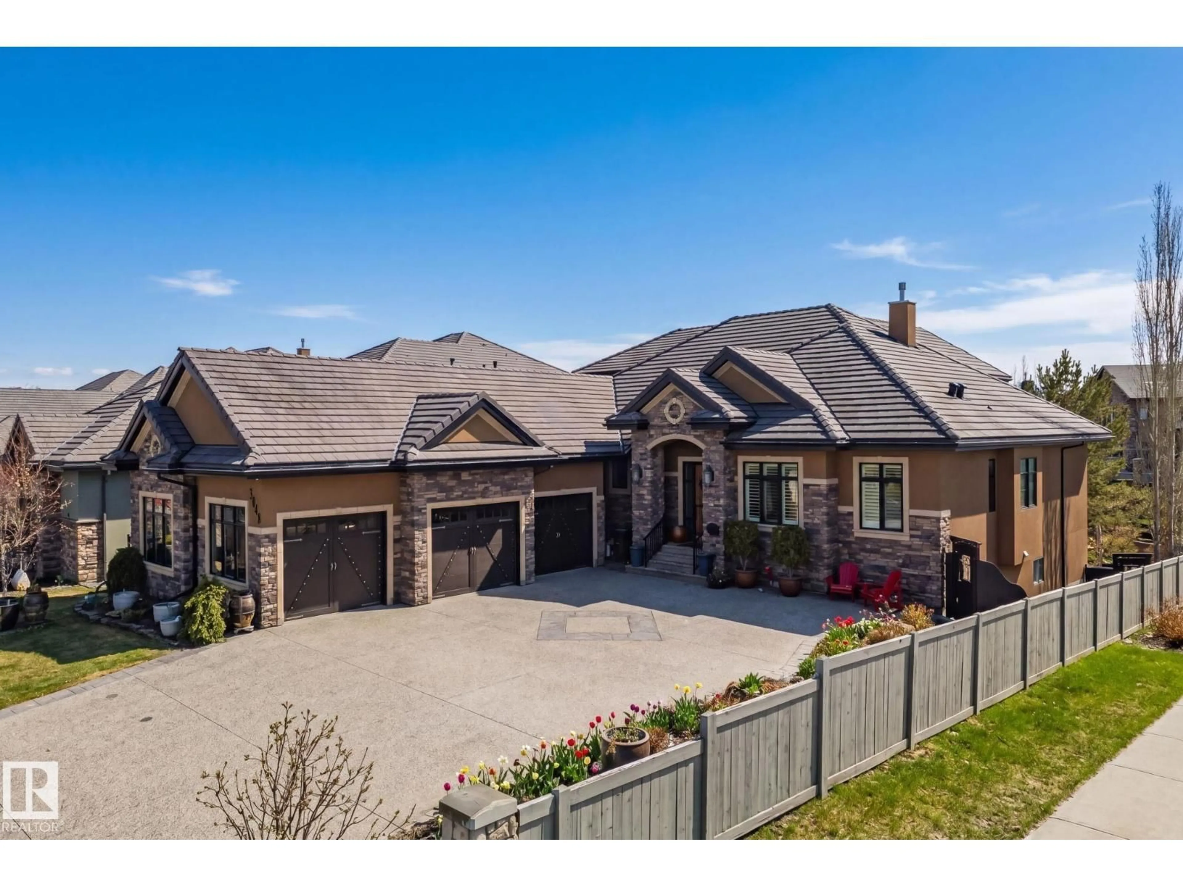 Home with brick exterior material, street for 3048 WATSON LD, Edmonton Alberta T6W2G4
